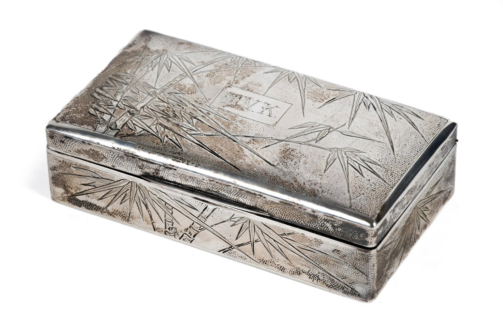 CHINESE SILVER HUMIDOR.: A vintage silver Chinese humidor, with bamboo decoration with monogram on top. Marked silver on bottom. 6.5” x 3.5”, 14.5 oz t.
