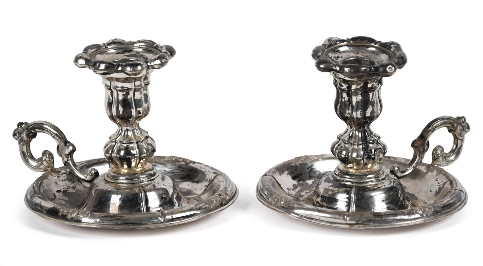 PR. RUSSIAN SILVER CHAMBER STICKS.: A pair of Russian silver chamber sticks, stamped 84 (representing 87.5% pure silver). 4.5”H x 5” dia. Weight 11.4 oz t.
