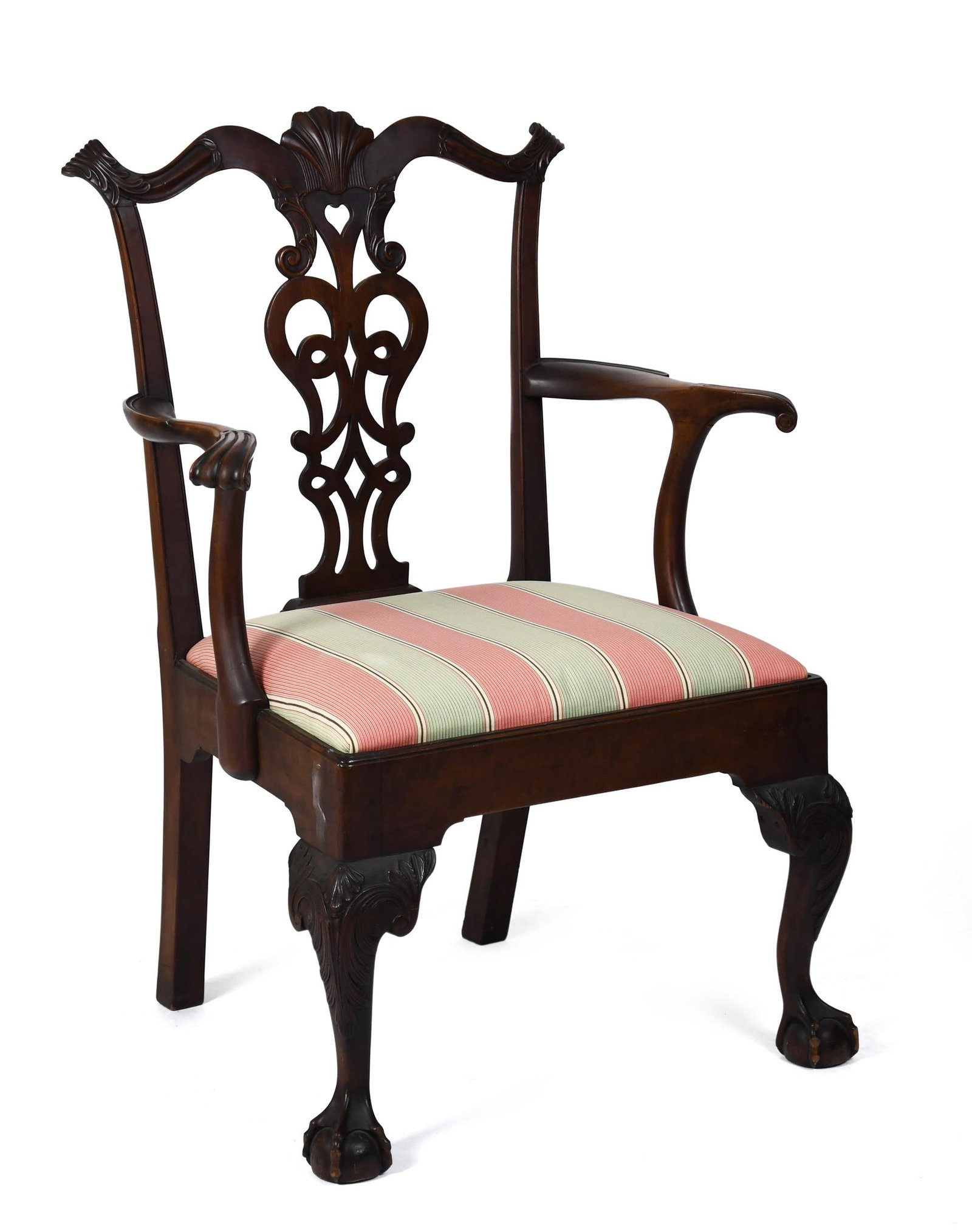 IMPRESSIVE CA. 1900 CHIPPENDALE MAHOGANY ARMCHAIR.: A good antique and impressively scaled Chippendale style carved mahogany arm chair with removable striped fabric upholstered slip seat and impressive carved cabriole legs, with pegged construction.
