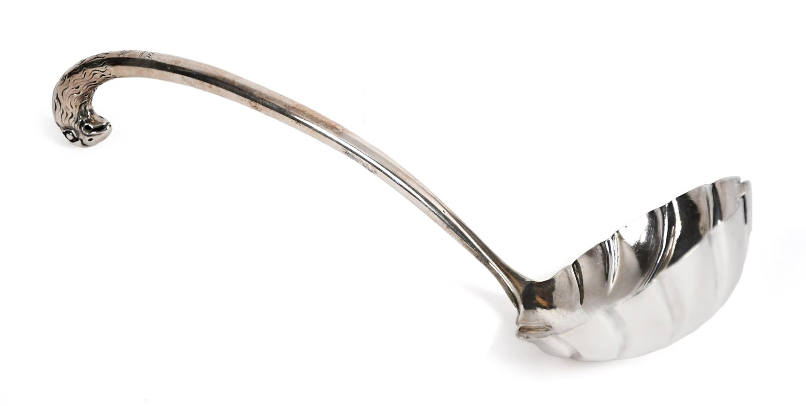 ORNATE ANTIQUE STERLING SILVER LADLE.: An antique ornate sterling ladle with an eagle head handle and shell formed bowl, unsigned. 13”L. 7.5 oz t.