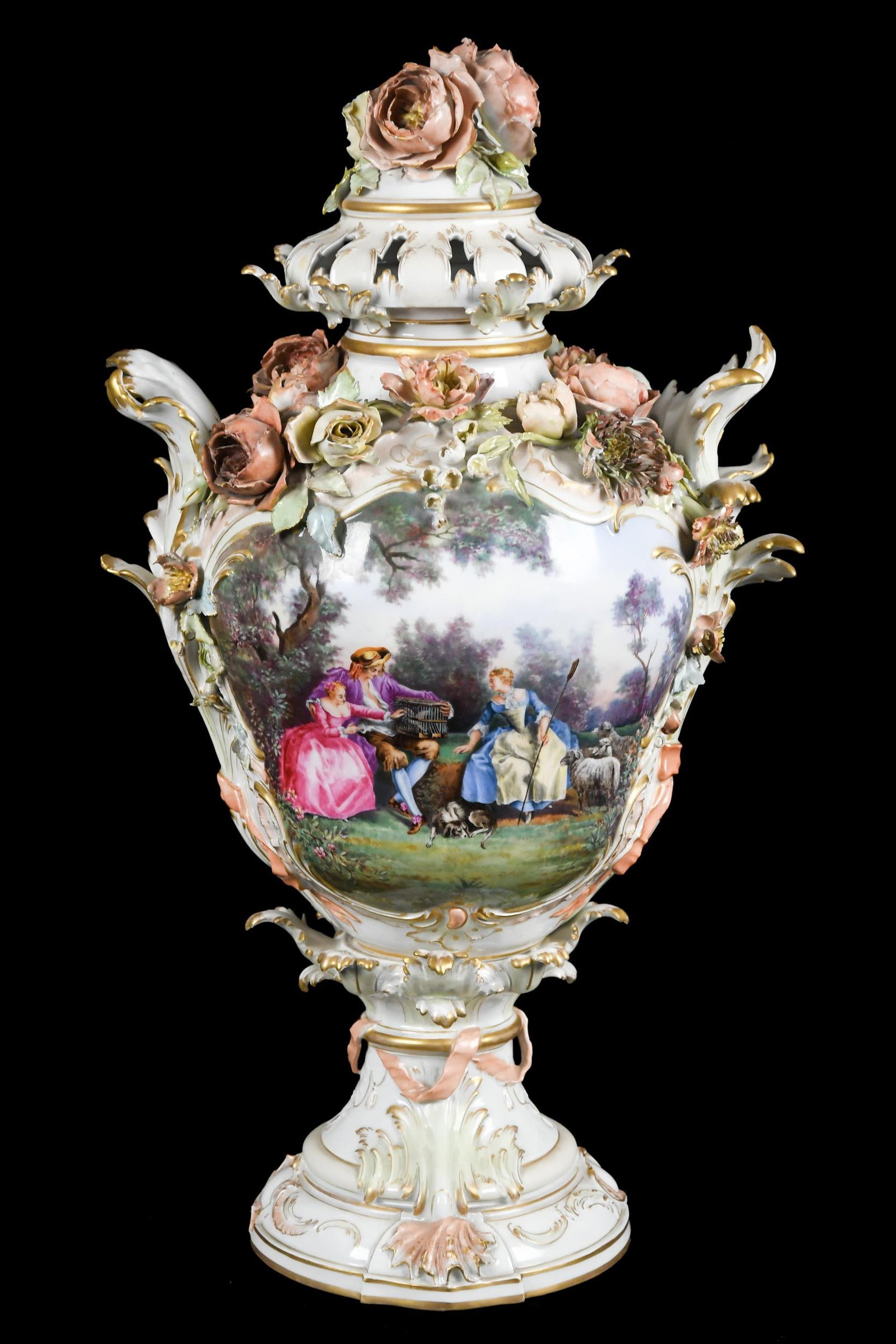 19TH C. KPM PORCELAIN URN.: An impressive 19th C. hand-painted KPM (blue scepter mark) porcelain urn with floral applications and wonderful hand painted body which features a Classical scene of traveling figures with animals. 21