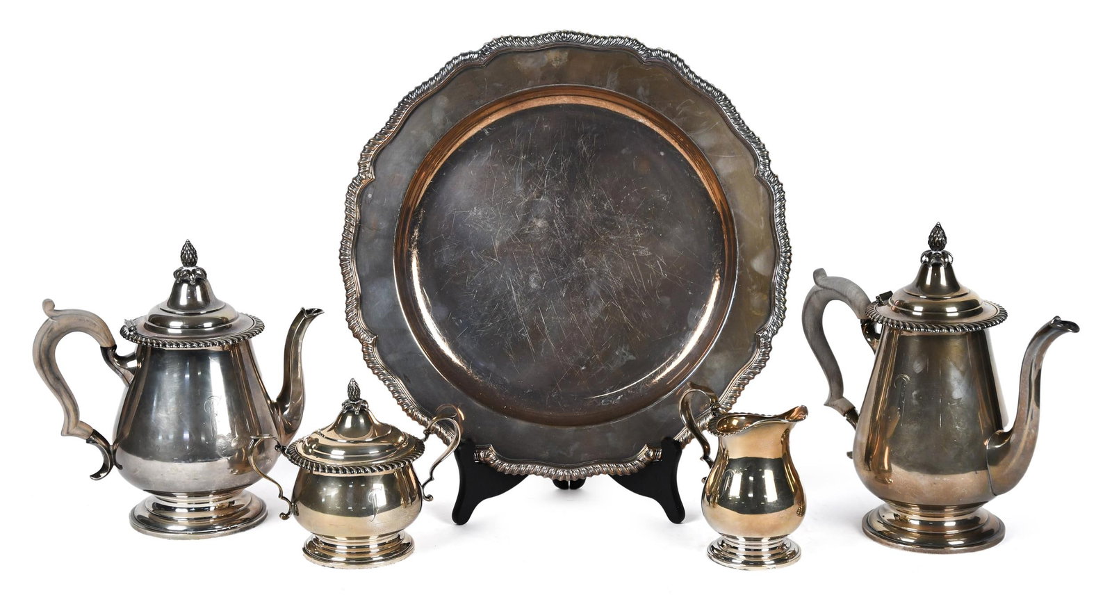 VINTAGE S&G GUMP CO. FOUR PIECE STERLING TEA SET.: A vintage 20th C. S&G Gump Co. sterling four piece tea set with silver-plated tray. Coffee and tea pot 9” & 10”H, cream and sugar 5” & 6”H. 67.5 oz t.