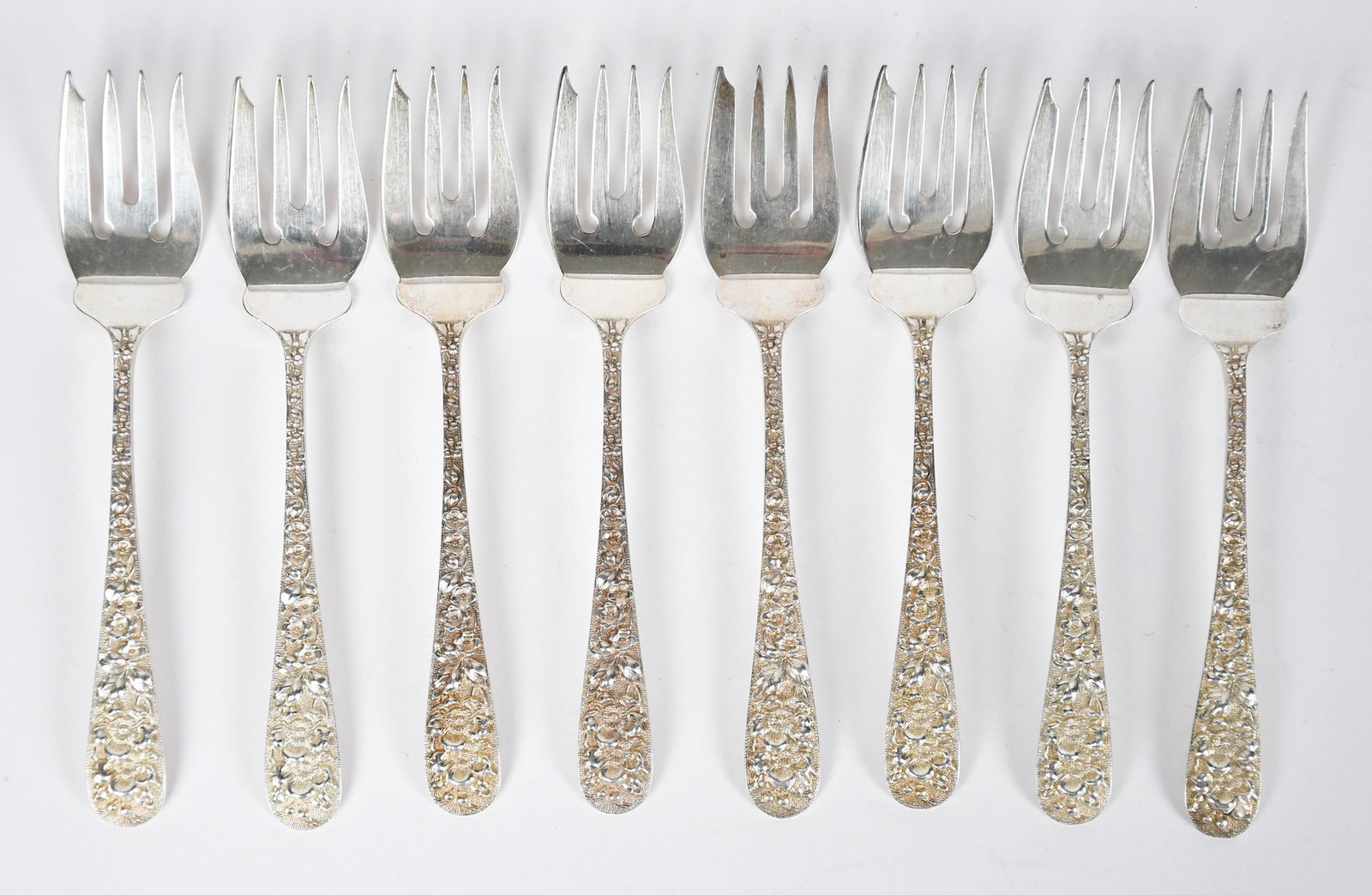 ANTIQUE STIEFF REPOUSSE STERLING FLATWARE. - 12