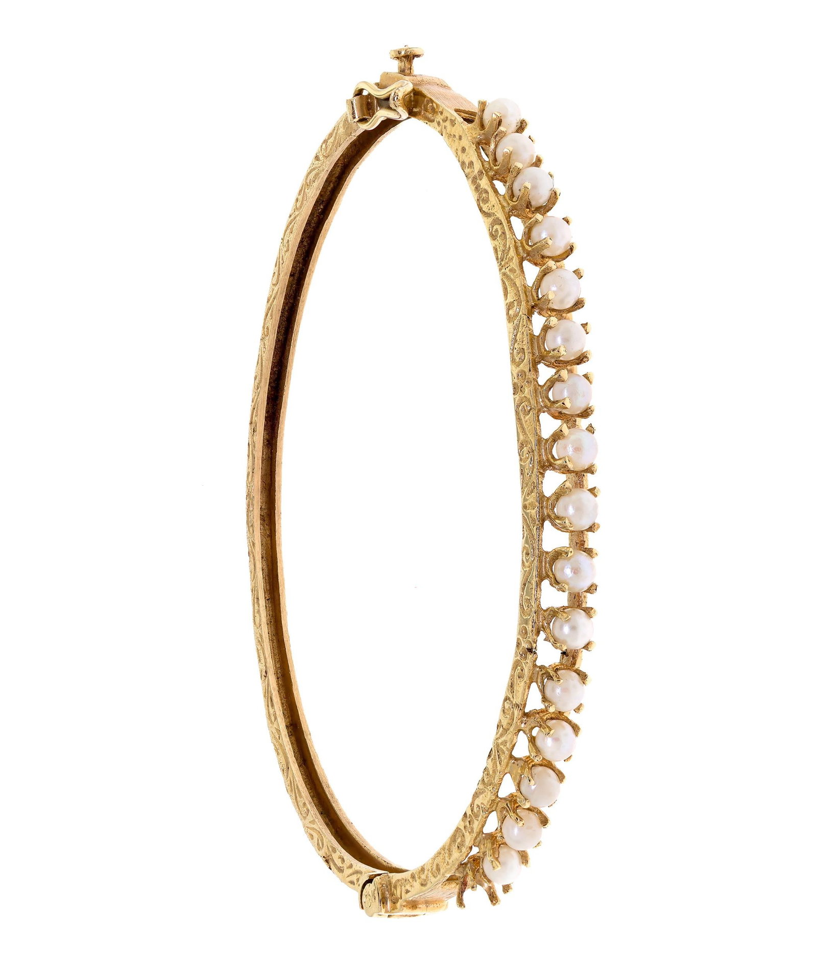 VINTAGE 14K GOLD PEARL HINGED-BANGLE BRACELET.: A vintage, 14k yellow gold (stamped) hinged-bangle bracelet with cultured, white pearls, 2.5mm round with fair to good luster, thin nacre, 4.5mm wide, 6 5/8 inch wrist, 10 grams.