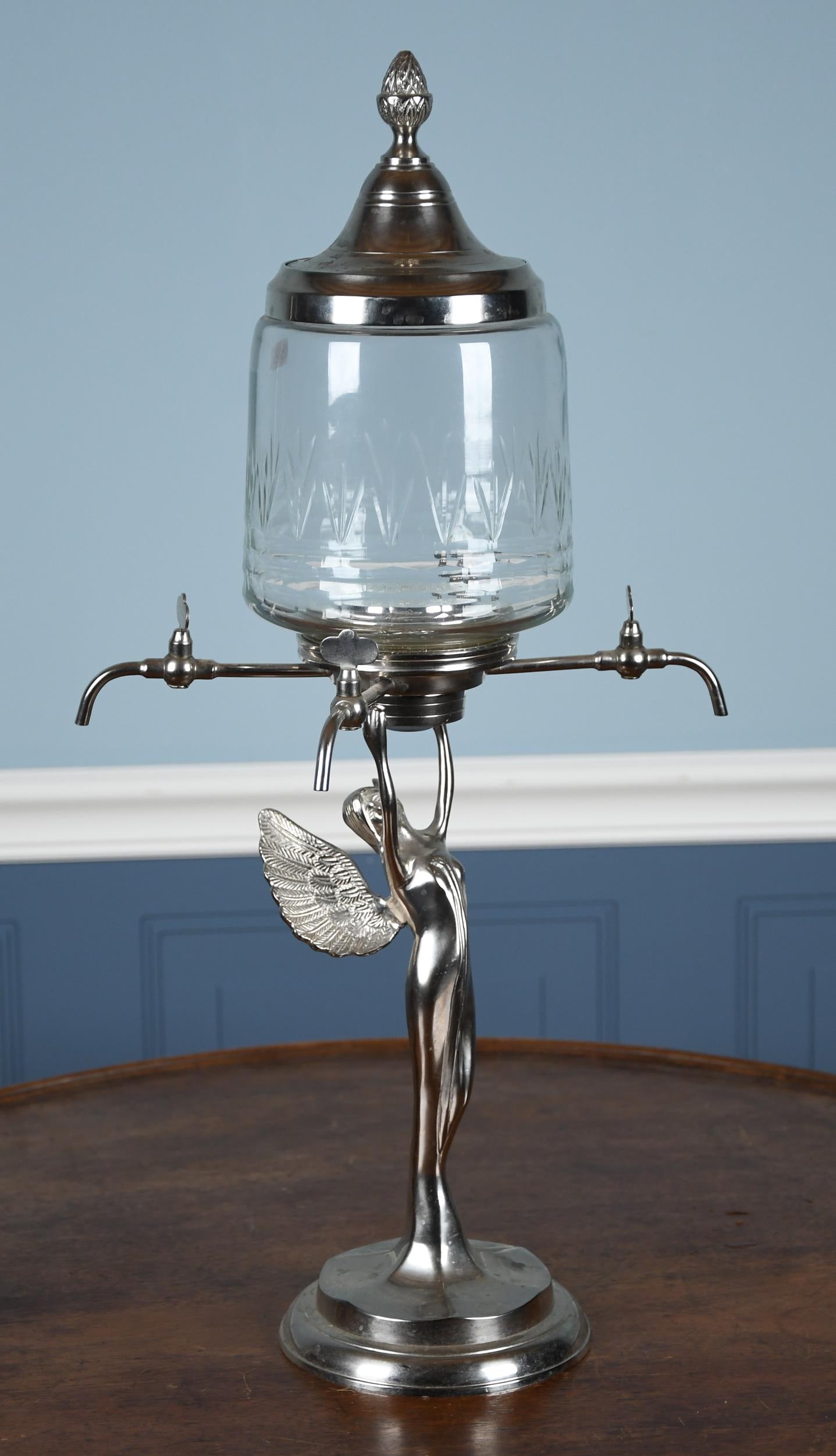VINTAGE ABSINTHE DISPENSER, NEW ORLEANS PROV.: A nickel plated Art Deco absinthe dispenser or urn.24”H.