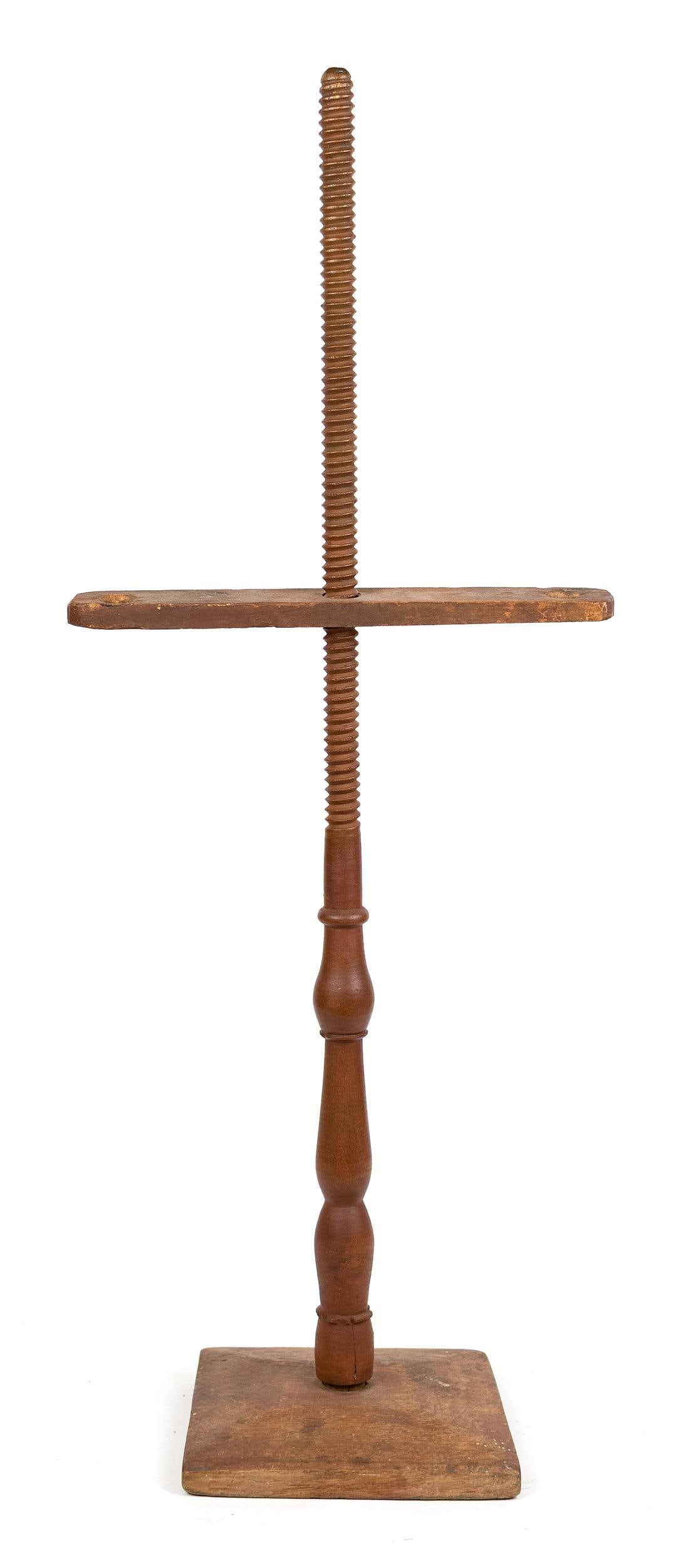 LATE 18TH C. ADJUSTABLE SCREW CANDLE HOLDER.: A late 18th C. red painted adjustable screw holder, with a chestnut base, maple turned shaft, and pine candleholders. 34.5”H x base 7” x 8.5”. Provenance: the estate of Donald Roach