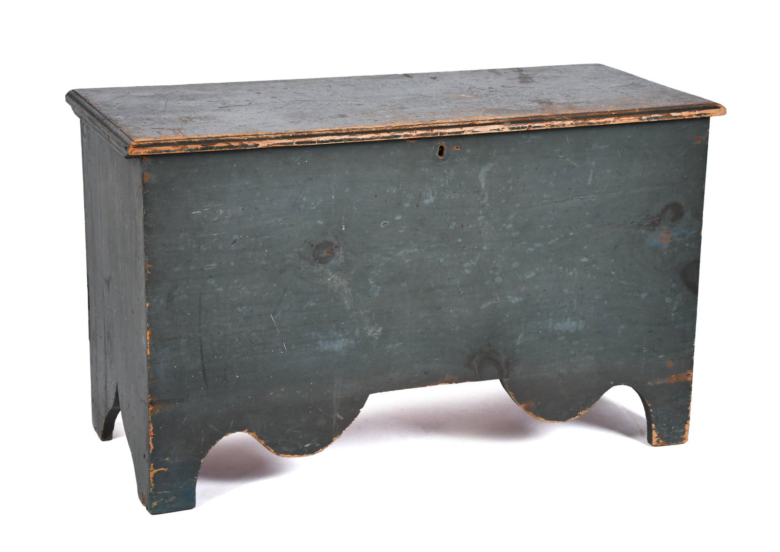 EARLY 19TH C. BLUE/GREEN PAINTED BLANKET BOX.: A wonderful early 19th C. New England blanket box in original blue green paint, a hinged lift top interior with a till, six board case, a beautiful scalloped front apron on cut out feet, 23”H x 