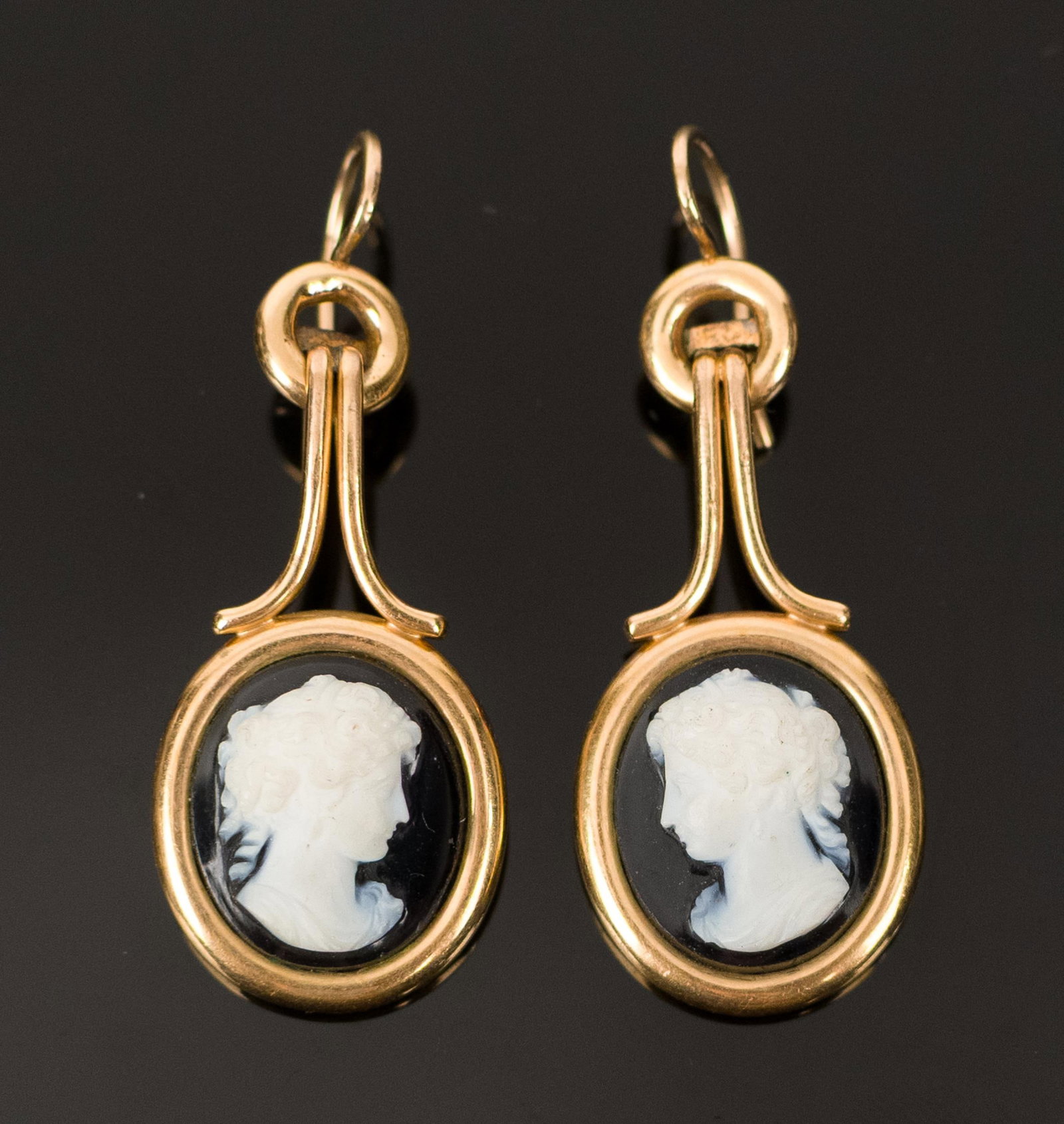 VICTORIAN 15K GOLD HARDSTONE CAMEO DANGLE EARRINGS.: A pair of Victorian, 15k rose gold (tested), hardstone cameo, dangle earrings, 1 7/8” long, 13.5 grams.
