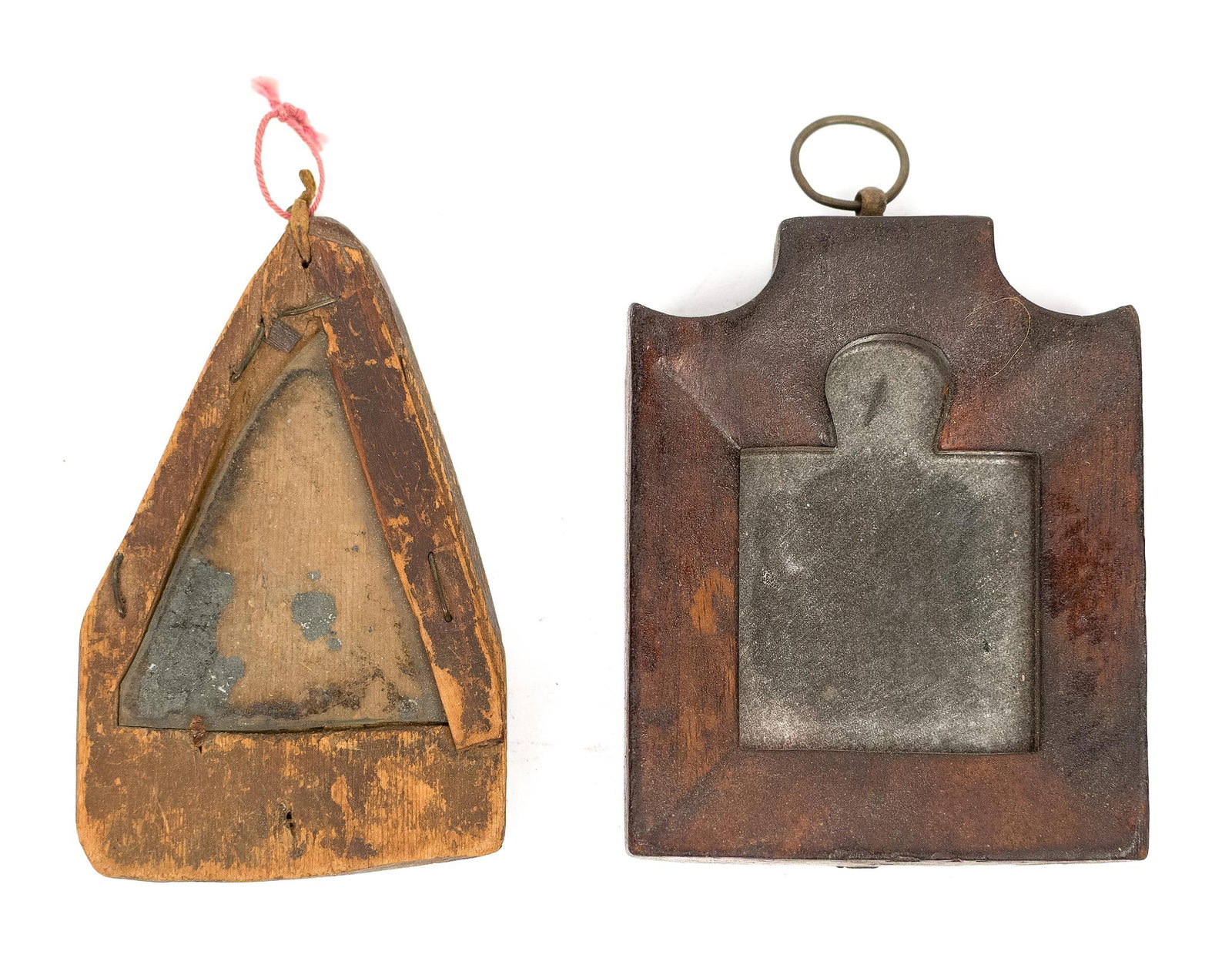 TWO EARLY SMALL MAKE-DO MIRRORS.: Two late 18th to early 19th C. ‘make do’ mirrors, the walnut example with a tombstone top 3.5” x 3”, other a very primitive example, triangular shape made of pine, 4” H.
