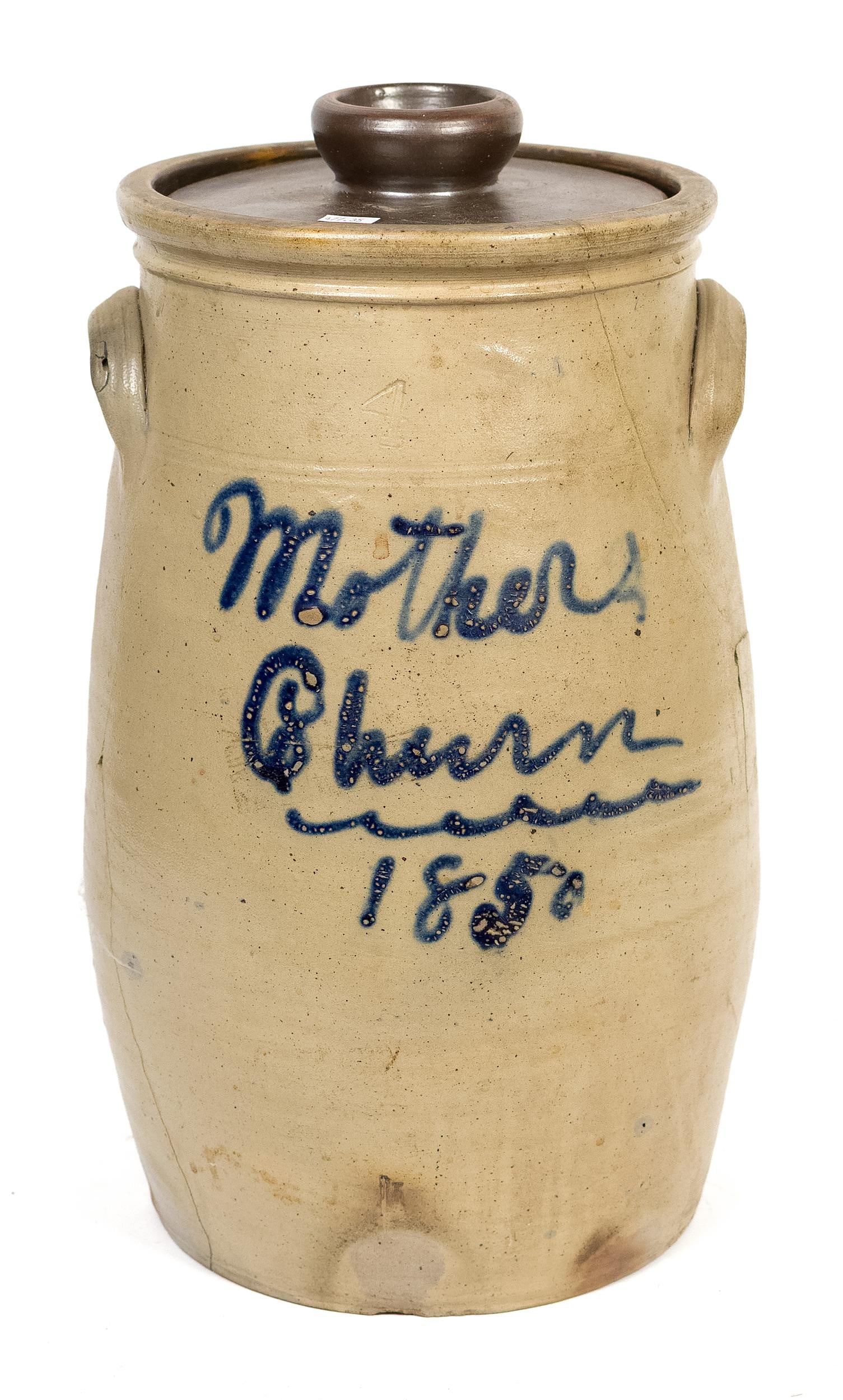ANTIQUE STONEWARE CHURN, MOTHER'S CHURN.: A 19th C. four-gallon stoneware butter churn with two applied handles and inscribed cobalt decoration, ‘Mother’s Churn 1851’. 16.25”H. Provenance: from the lifelong, curated