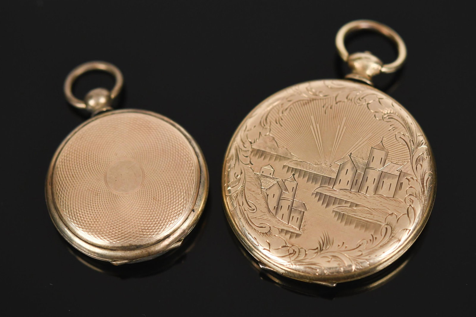 TWO ANTIQUE 10K-14K GOLD LOCKETS.: Two, antique, 10k-14k yellow gold (tested), lockets, one with photo of a man, peeled back or split, hand-engraved, cover, 44mm, hand-engraved, case; 34mm case, with tintype photos of a man and woman,