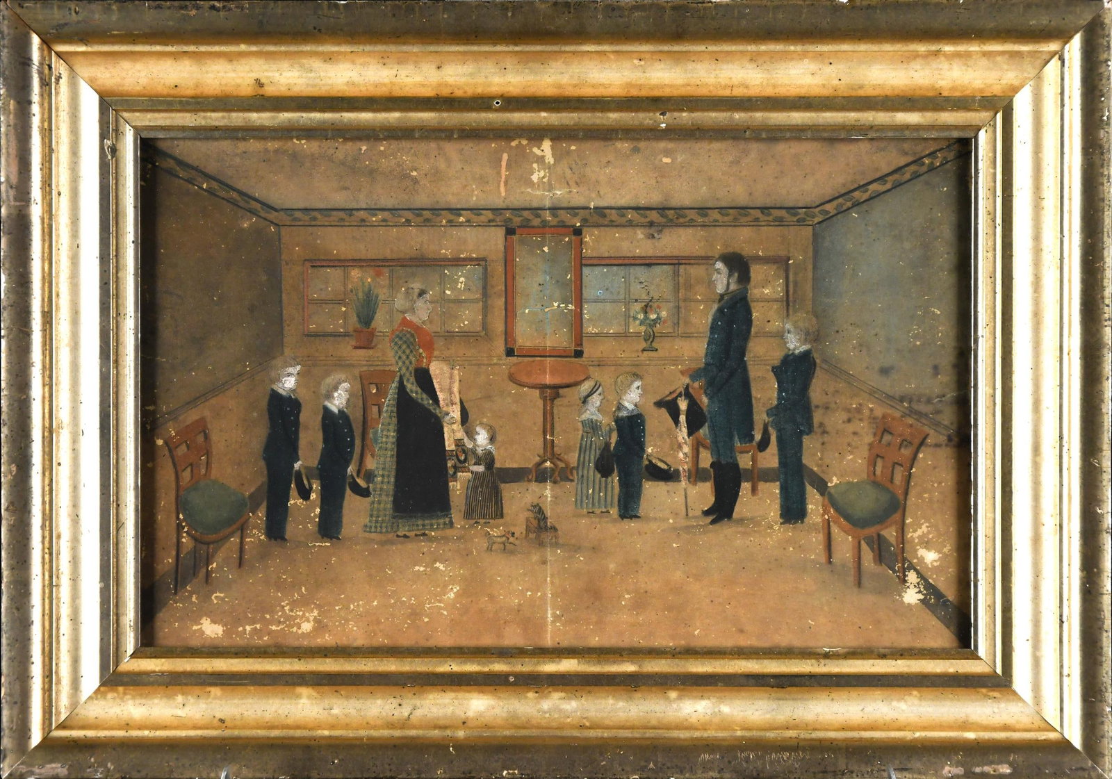 19TH C. FOLK ART PAINTING, FAMILY INTERIOR.: An early 19th C. pencil and ink, family interior with their pets, in a period lemon gold frame. Image 10” x16”, Frame 14.5” x 21”.