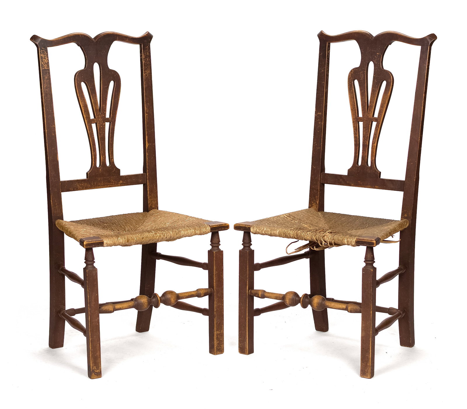 PR. NE COUNTRY CHIPPENDALE RED STAINED CHAIRS.: A good pair of ca. 1780 New England country Chippendale maple side chairs in an old red stain. Each with a carved serpentine crest rail, vase form pierced splats, rush seats, on square Chippendale leg
