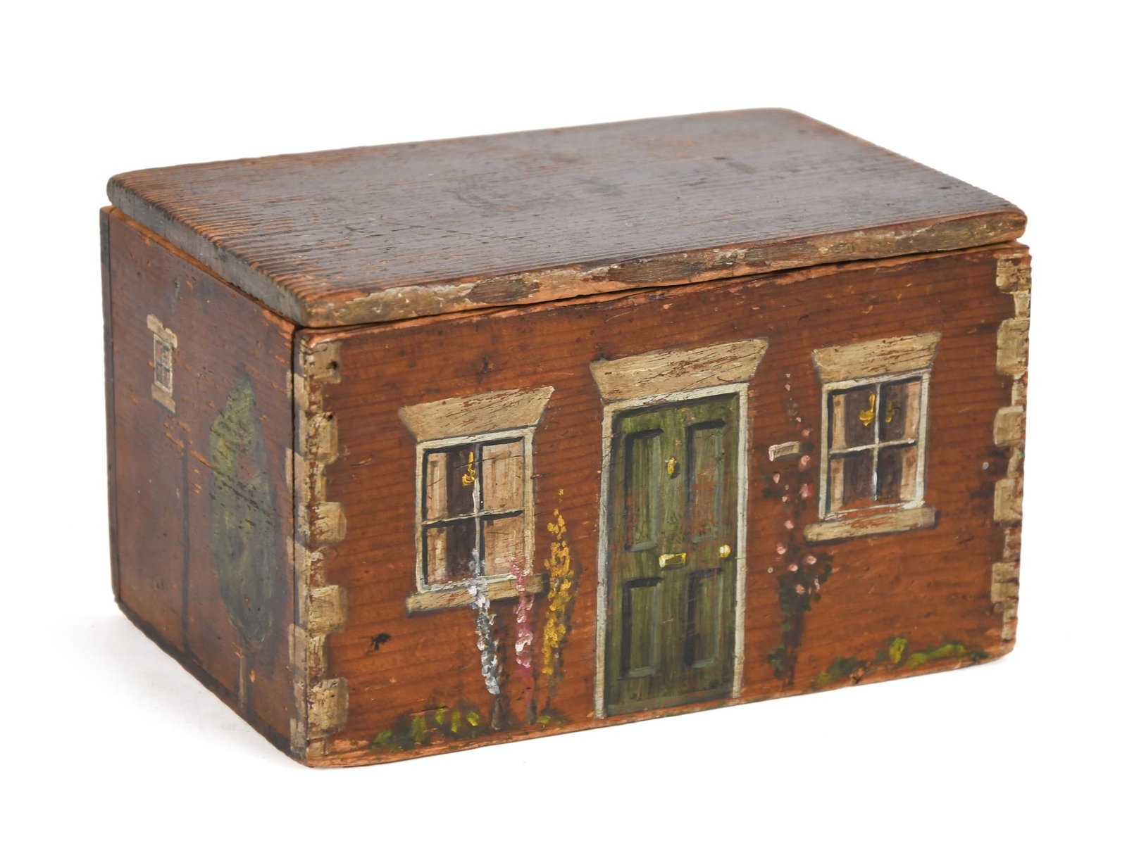 WHIMSICAL PAINTED PINE BOX.: 19th C. six board pine box, paint decorated in a whimsical manner, depicting a cottage house, door and windows with stone block corners 5”H x 8”W x 5.5”D. Provenance: from the