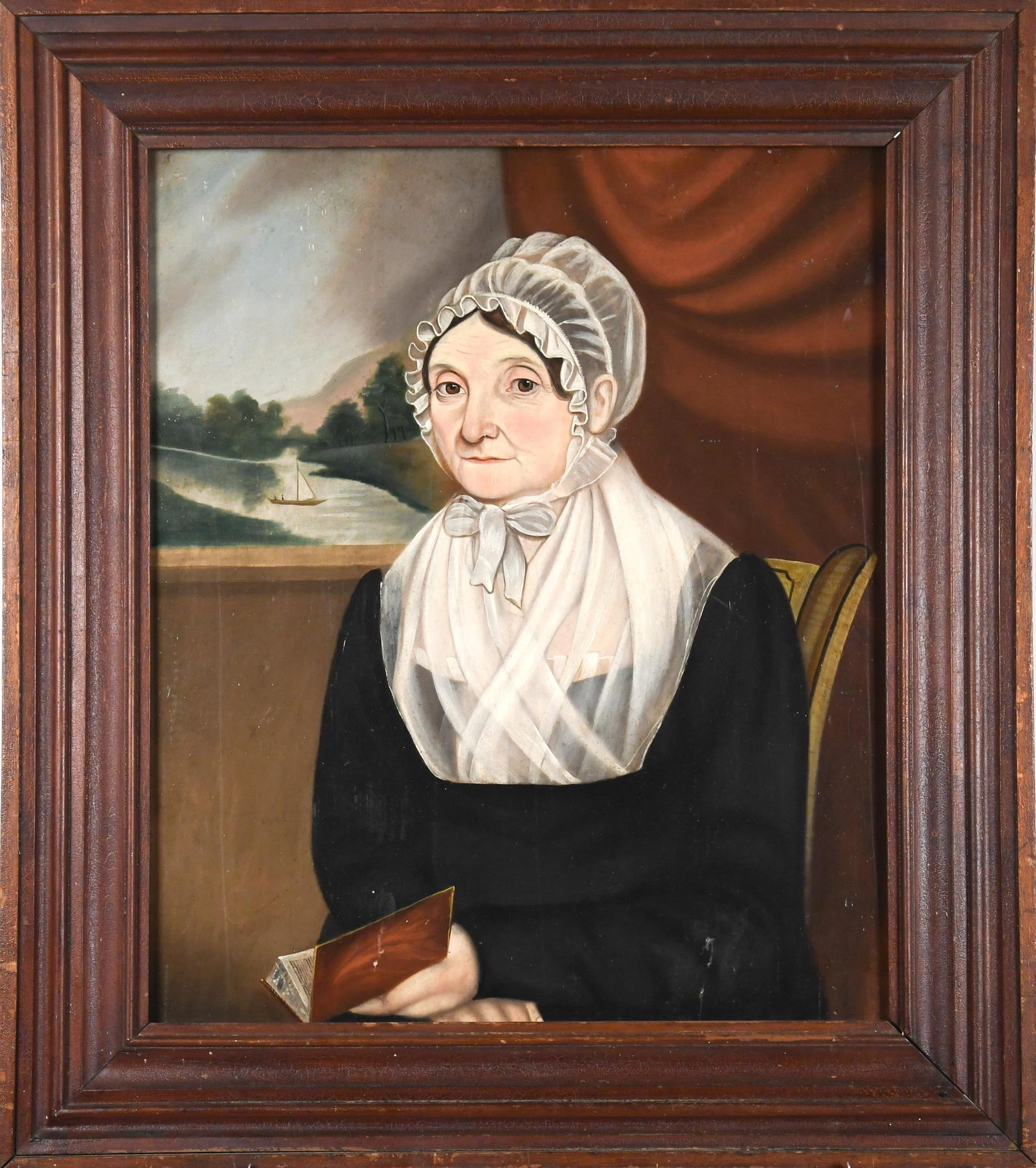 19TH C. AMERICAN SCHOOL OIL, PORTRAIT OF WOMAN.: A ca. 1830 American School Folk Art oil on wood panel portrait of an elderly woman, illegible signature on back. The woman sits on a paint decorated Federal chair, holding an open book in her hand.