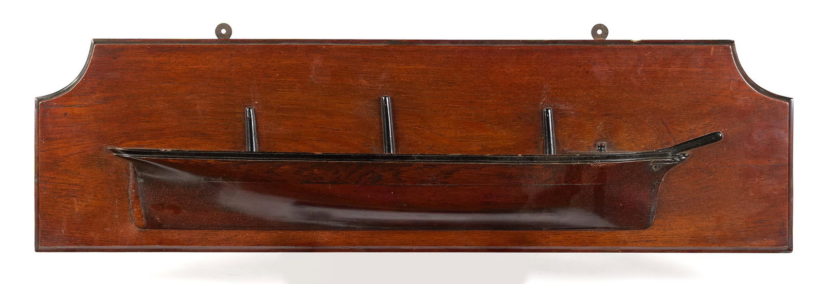 ANTIQUE WALNUT SHIPS HALF HULL.: A late 19th C. walnut ships half hull with black painted highlights mounted to a walnut board, 10” x 35”. Provenance: the estate of Donald Roach Barrington RI.