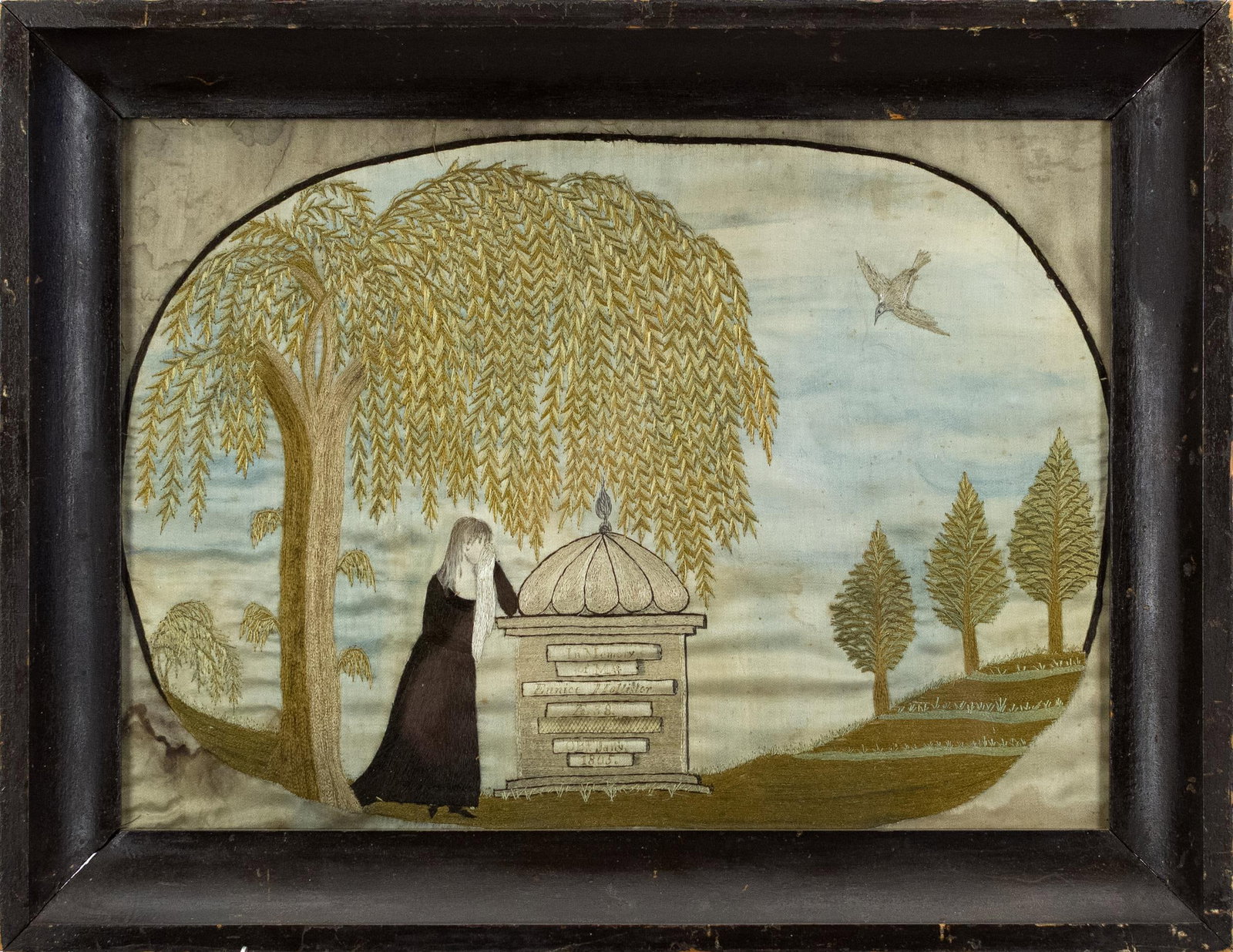 1805 EMBROIDERED MOURNING SCENE ON SILK.: Early 19th C. mourning scene on silk, woman at crypt under weeping willow with bird and trees. Verse, ‘In Memory of Eunice Hollister AE 38 OB Jan. 1805’. Image 16.75” x 12”,
