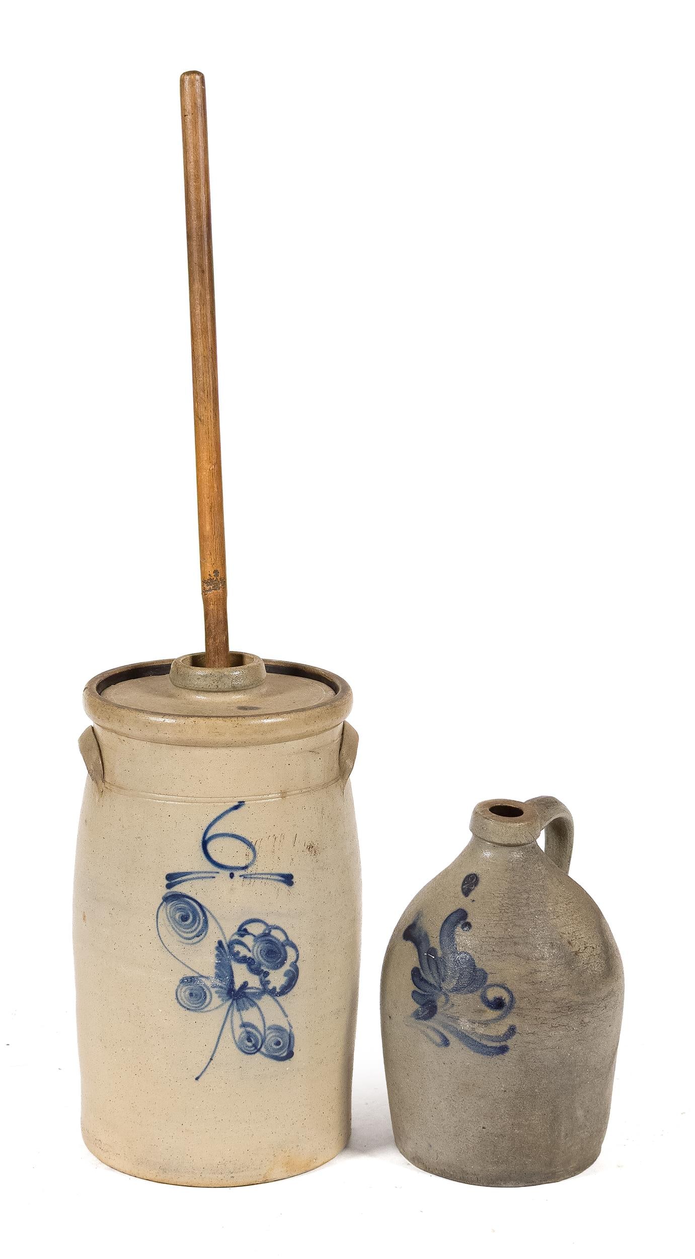 19TH C. DECORATED STONEWARE CHURN AND JUG, 2PCS.: A 19th C. decorated stoneware, jug and butter churn. Six gallon churn has original functioning dasher and jug with simple classic design. Jug 13” x 8”, Churn 18” x 9.75”.