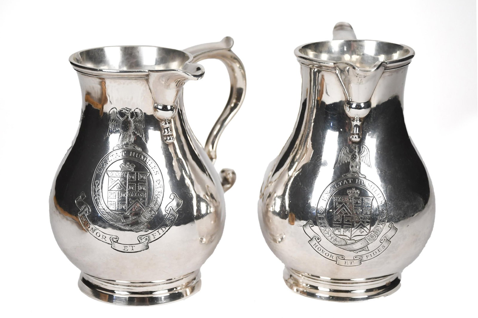 TWO ANTIQUE STERLING CHOCOLATE POTS.: Two 19th C. sterling baluster shape chocolate pots, including one example with handle perpendicular to spout, 15.60 oz t. 4.5”H, and one example with handle parallel to spout, 15.55 oz t.
