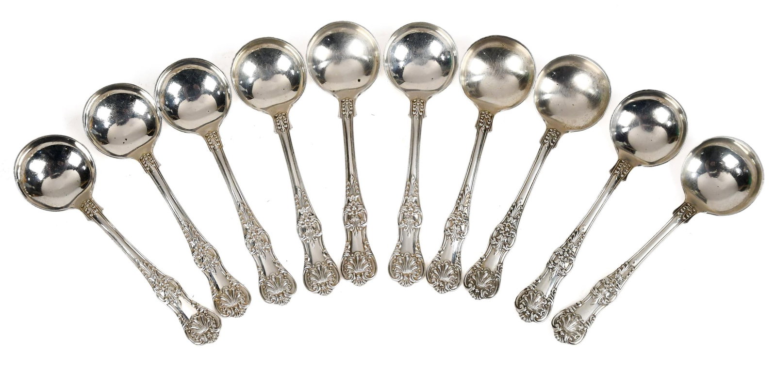 TEN VINTAGE ENGLISH KING TIFFANY STERLING SPOONS.: A set of ten mid 20th C. Tiffany & Co English King sugar spoons with shell and scroll design. 12.45 oz t. 5.25”L.