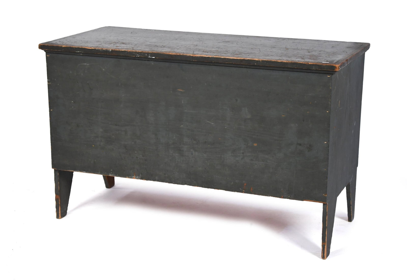 19TH C. GREEN PAINTED BLANKET BOX.: A ca. 1820 New England blanket box in original blue green paint. A hinged lift top, open interior, a six board case with high cut out ends., 26.5” H x 43”W x 19”D.