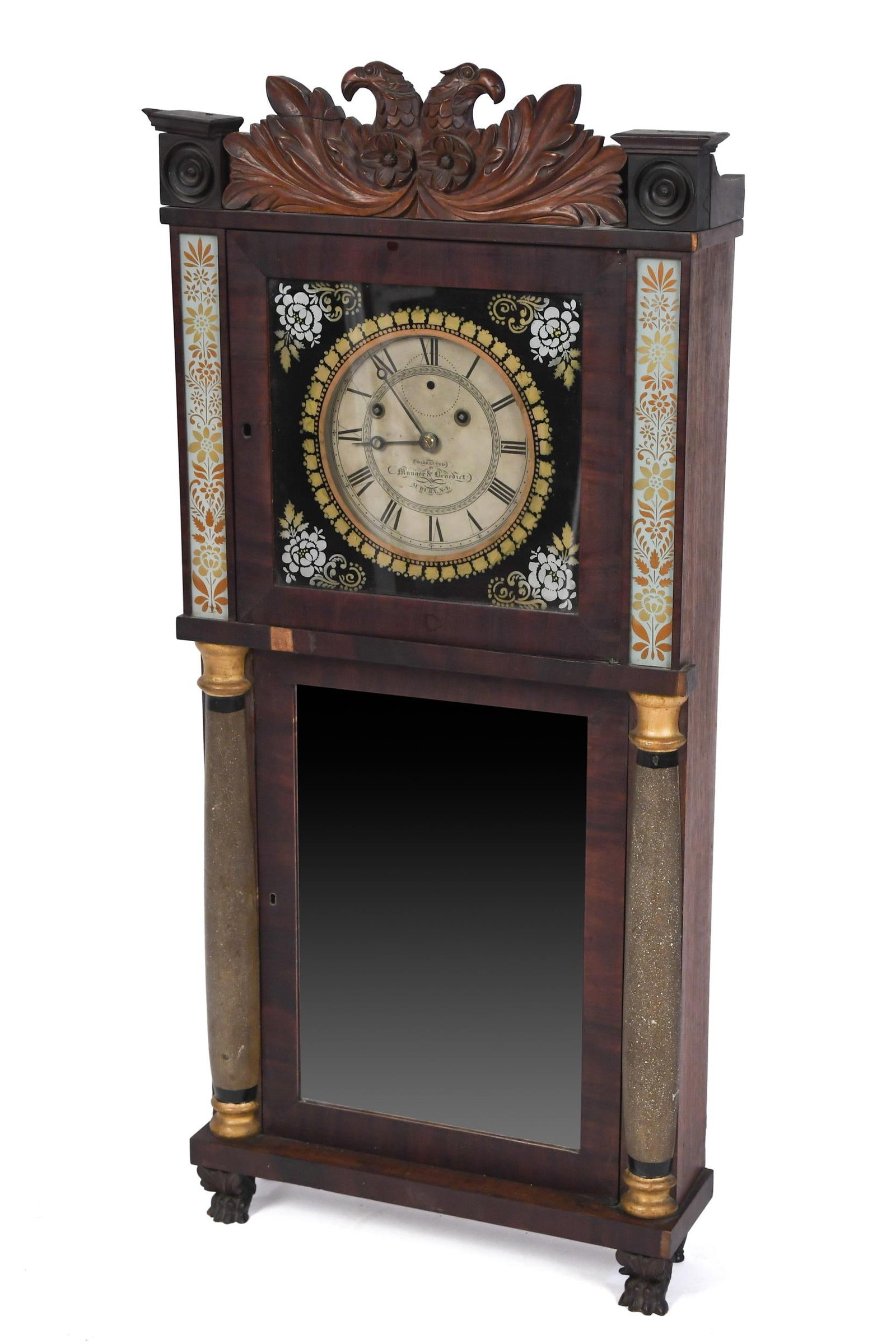 19TH C. MONGER AND BENEDICT AUBURN, NY SHELF CLOCK.: A Munger & Benedict Empire Period shelf clock. 8-day weight driven brass time and strike movement, Mahogany case with carved Eagle crest, above an upper dial door with reverse painted glass and a