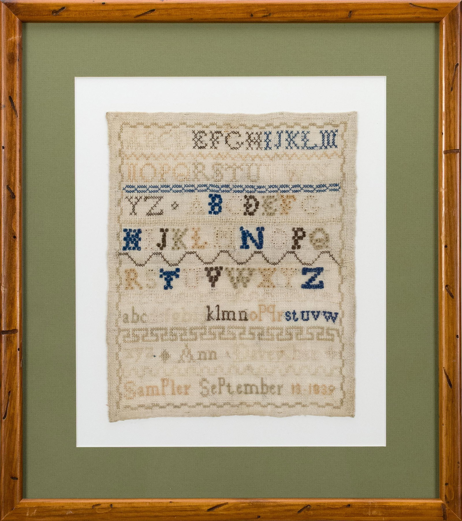 1839 ANN DAVEY SAMPLER.: A 19th C. alphabet sampler with upper and lower case and geometric motif, Ann Davey 1839. Image, 8.25” x 10”, Frame, 13.25” x 17.5”.