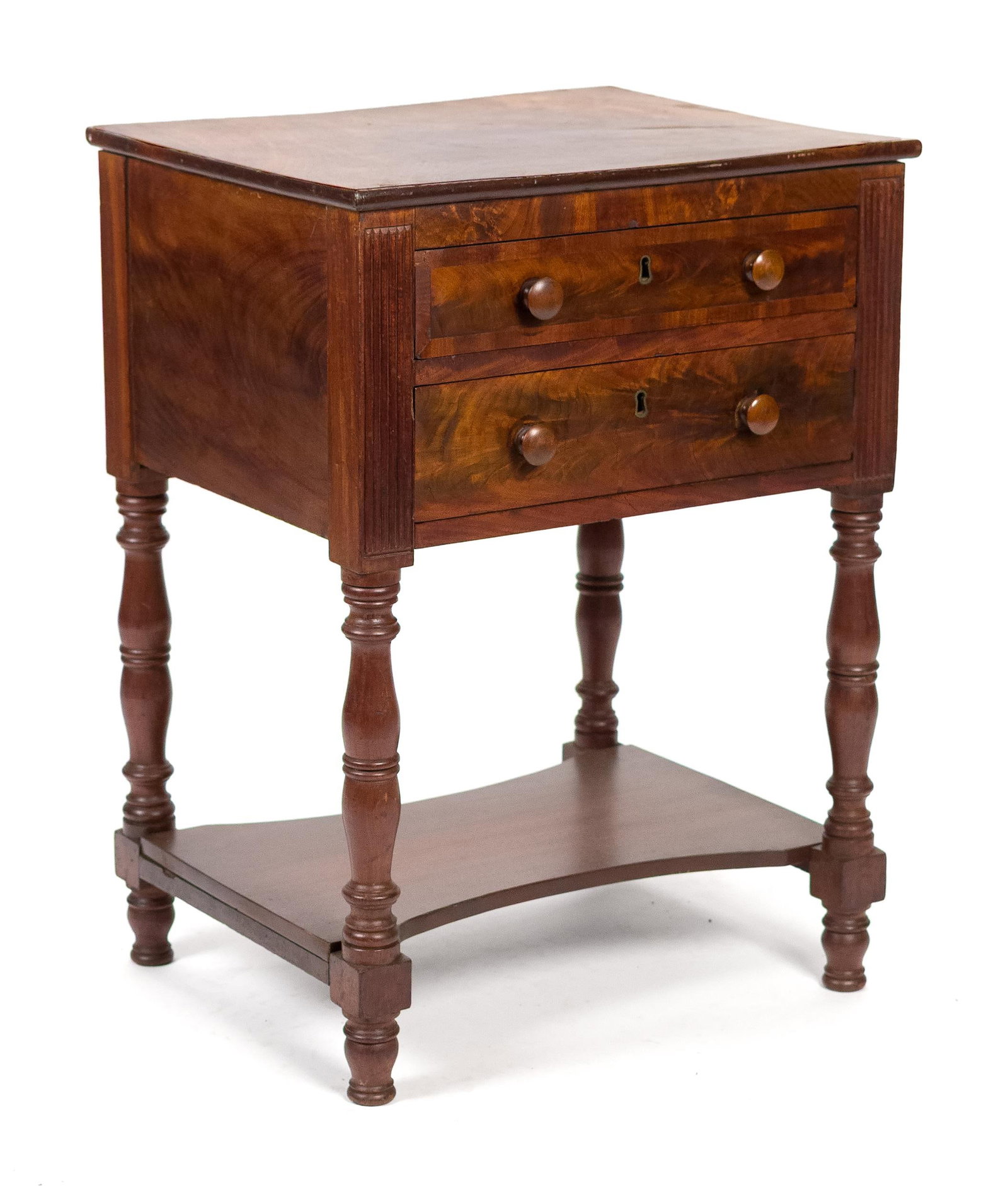 FEDERAL NEW YORK MAHOGANY WORK STAND.: A ca. 1820 Federal New York work stand with rich mahogany, a rectangular one board top over two dovetailed drawers flanked with reeded pilasters, and a lower shelf on turned legs, 28”H s