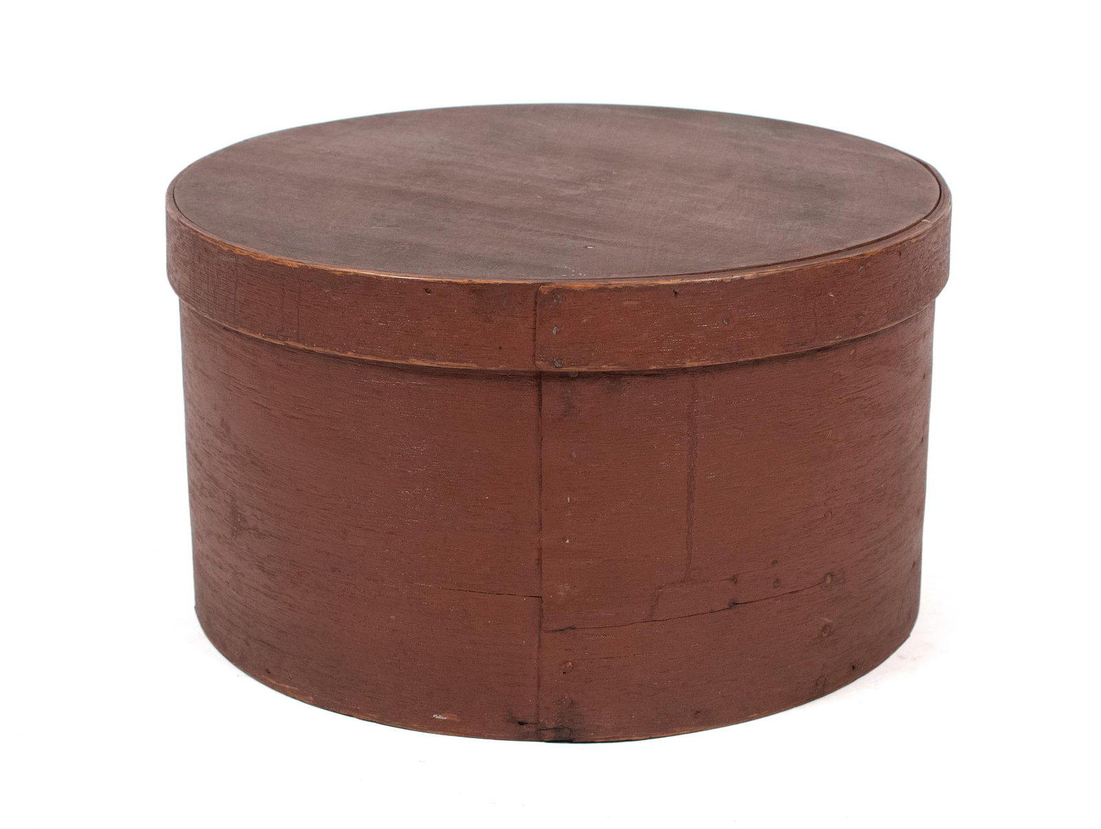 19TH C. CIRCULAR RED PAINTED PANTRY BOX.: A 19th C. covered and red painted and circular pantry box.19.5”H x 15.25”D.