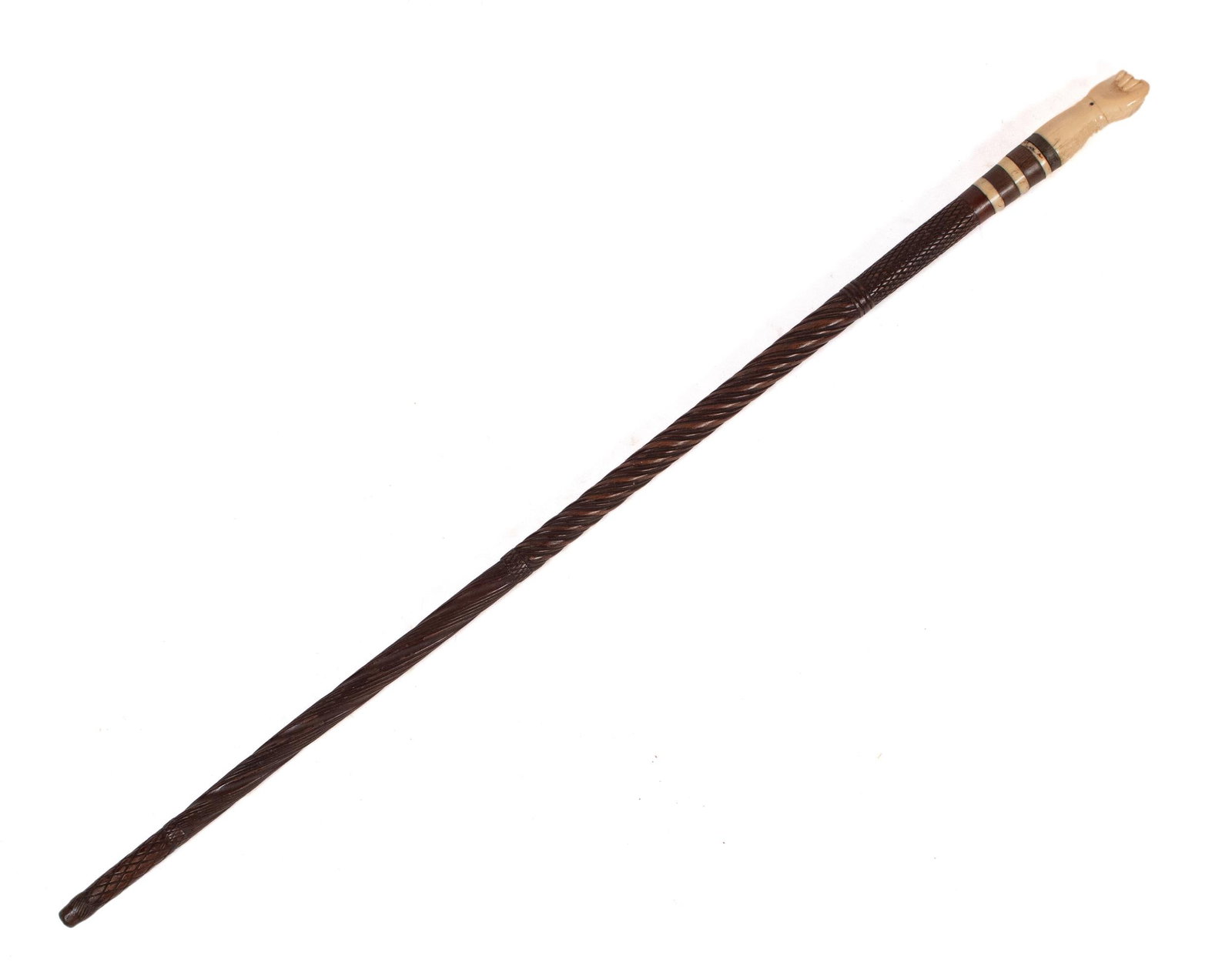 ANTIQUE SAILOR-MADE CLENCHED-FIST WALKING STICK.: A late 19th C. sailor-made carved walking stick with clenched fist motif. 33.5”L.