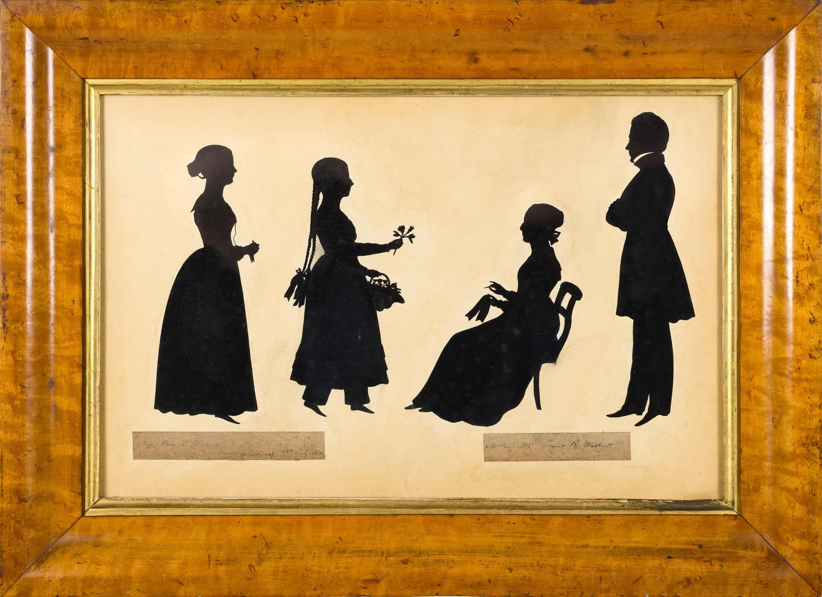 19TH C. HOLLOW CUT SILHOUETTE, WESTCOTT FAMILY, NY.: A ca. 1840 New York hollow-cut silhouette depicting the Westcott Family, father James R. Westcott, his wife, Mary and their daughters. Image 11” x 16.5”, Frame 16” x 22”.
