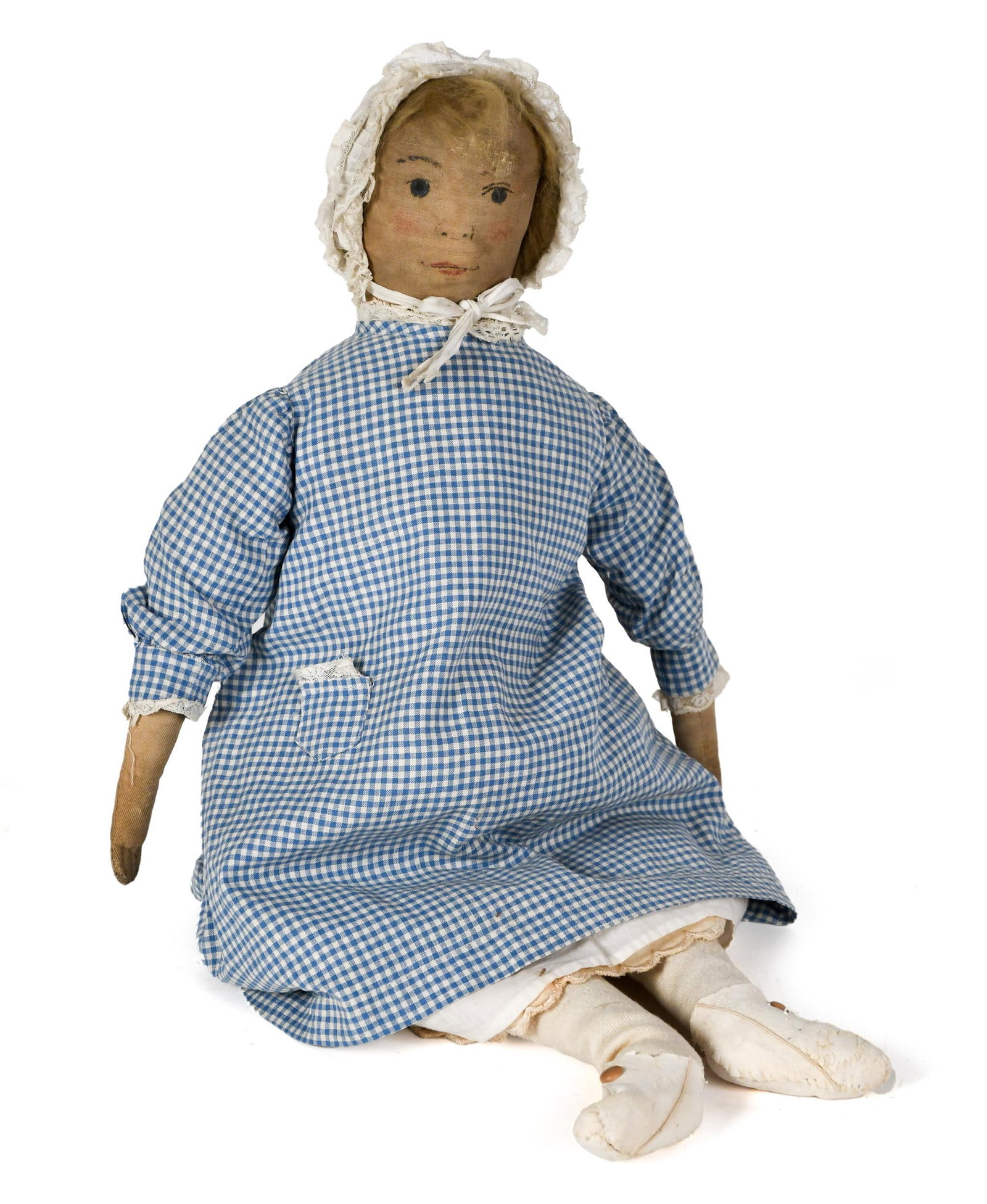 LARGE 19TH C. CLOTH DOLL.: A ca. 1890 blue-eyed cloth doll in gingham dress with bonnet and leather boots. 26”H. Provenance: from the lifelong, curated collection of Kathy Schoemer, Walpole, NH.