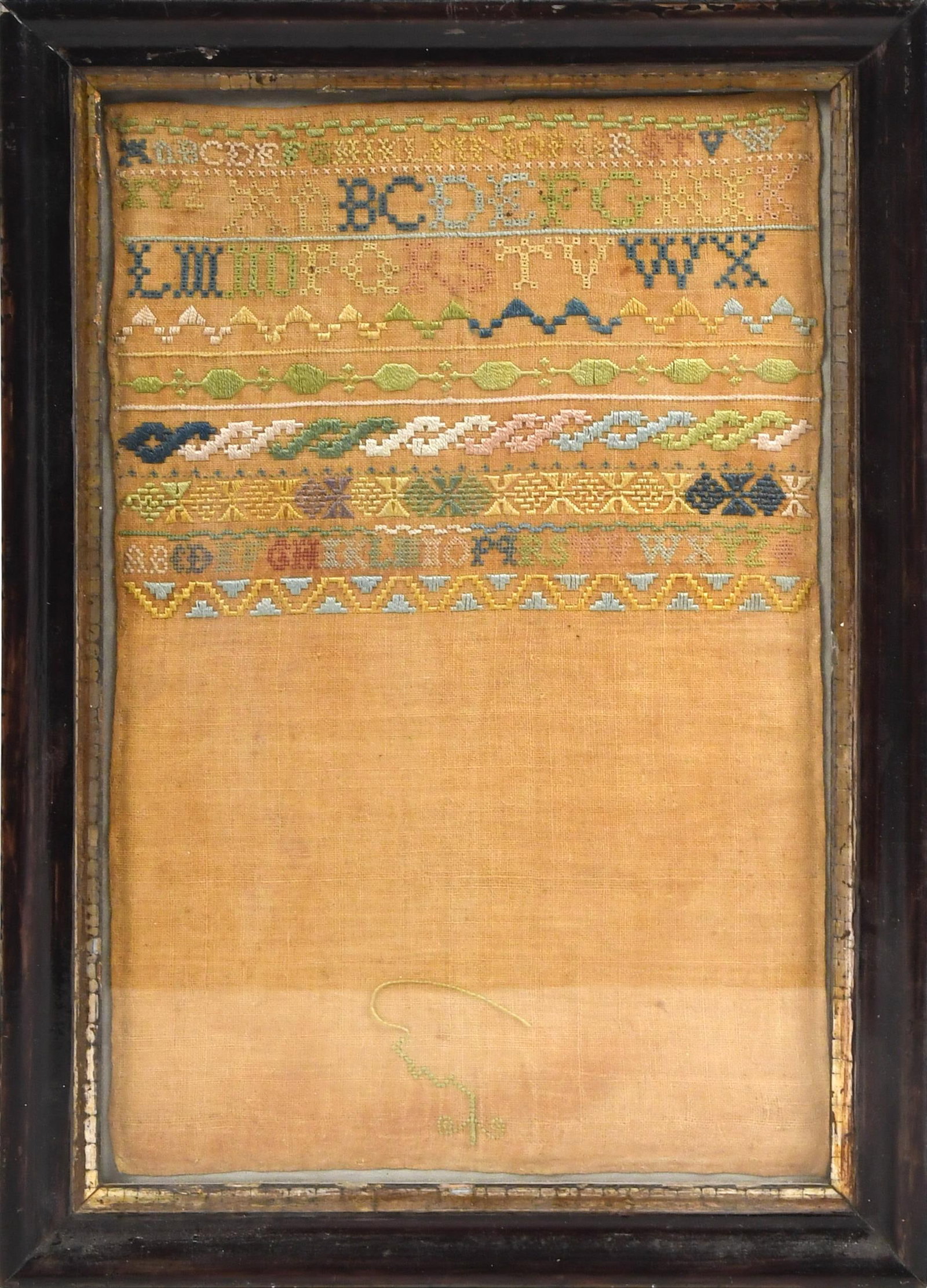COLORFUL UNFINISHED ANTIQUE SAMPLER.: A ca. 1820 colorful unfinished alpha-numeric sampler well executed with retentive geometric banding on muslin. Sampler 12”H x 7.5”W, Frame 14”H x 10”W. Provenance: from the