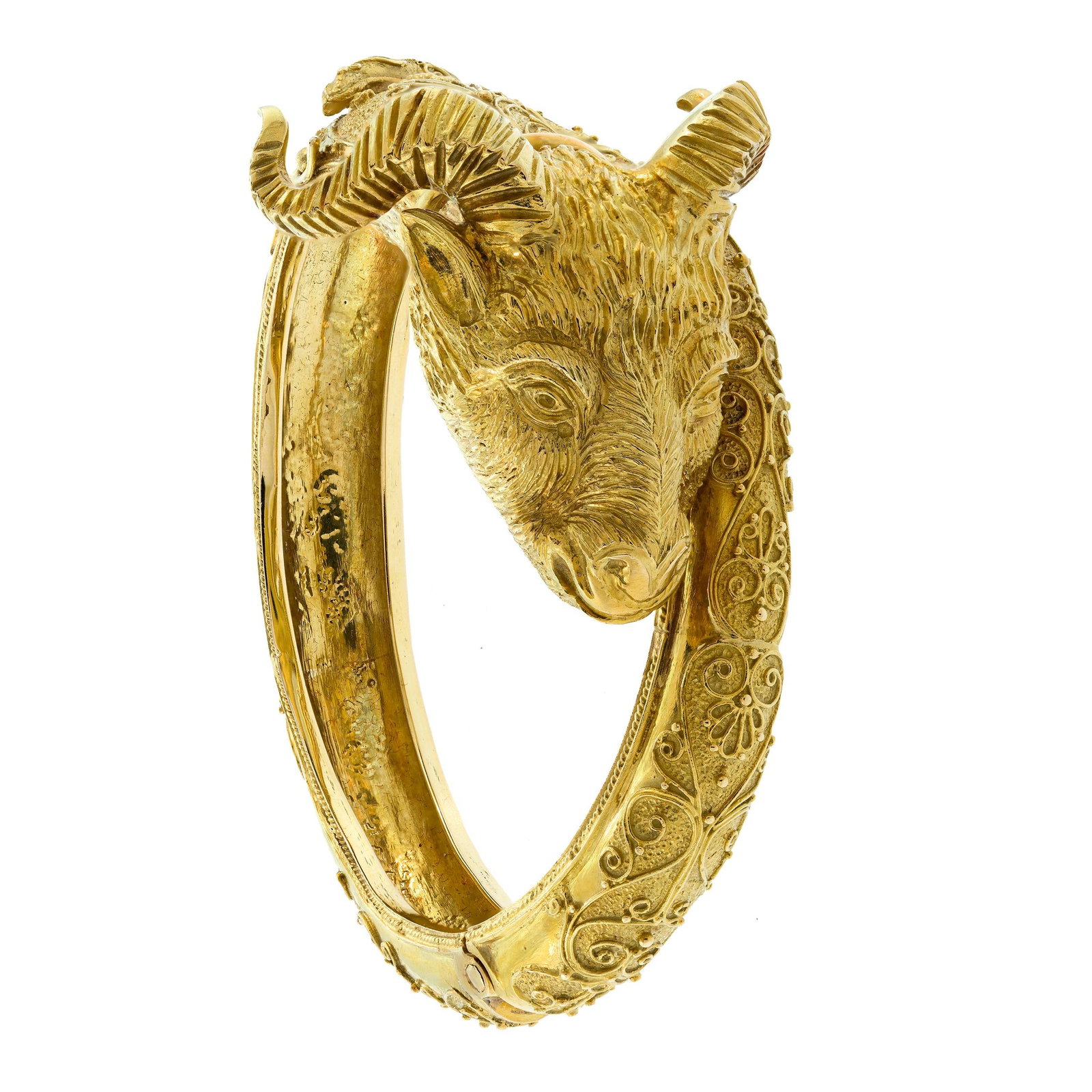 VINTAGE ETRUSCAN STYLE 18K GOLD RAM'S HEAD BRACELET.: A vintage, Etruscan-style, 18k yellow gold (stamped), ram's head, hinged-bangle, bracelet, 1 5/8 inches wide at the top, approx. 6 1/4 inch wrist, 95.5 grams. Provenance: a prominent Washington, DC fa