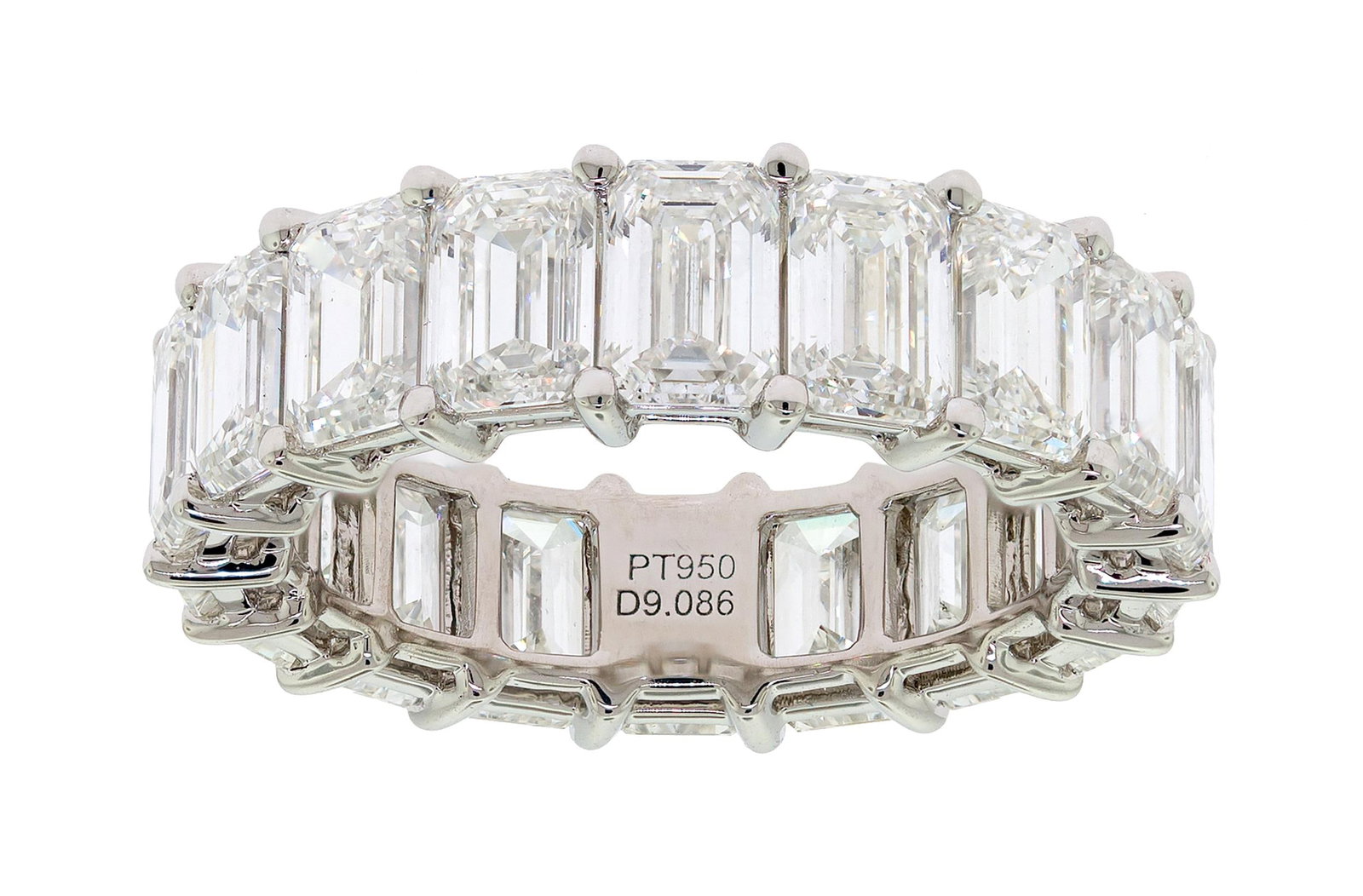 PLATINUM 9.08 CT. TW. EC DIAMOND ETERNITY BAND.: A platinum (stamped), eternity band set with exactly, 9.08 ct. tw., emerald cut, natural diamonds of H-I color and VS1 clarity. Ring size 7, 6mm wide, 7.4 grams. Tested as natural mined diamonds.