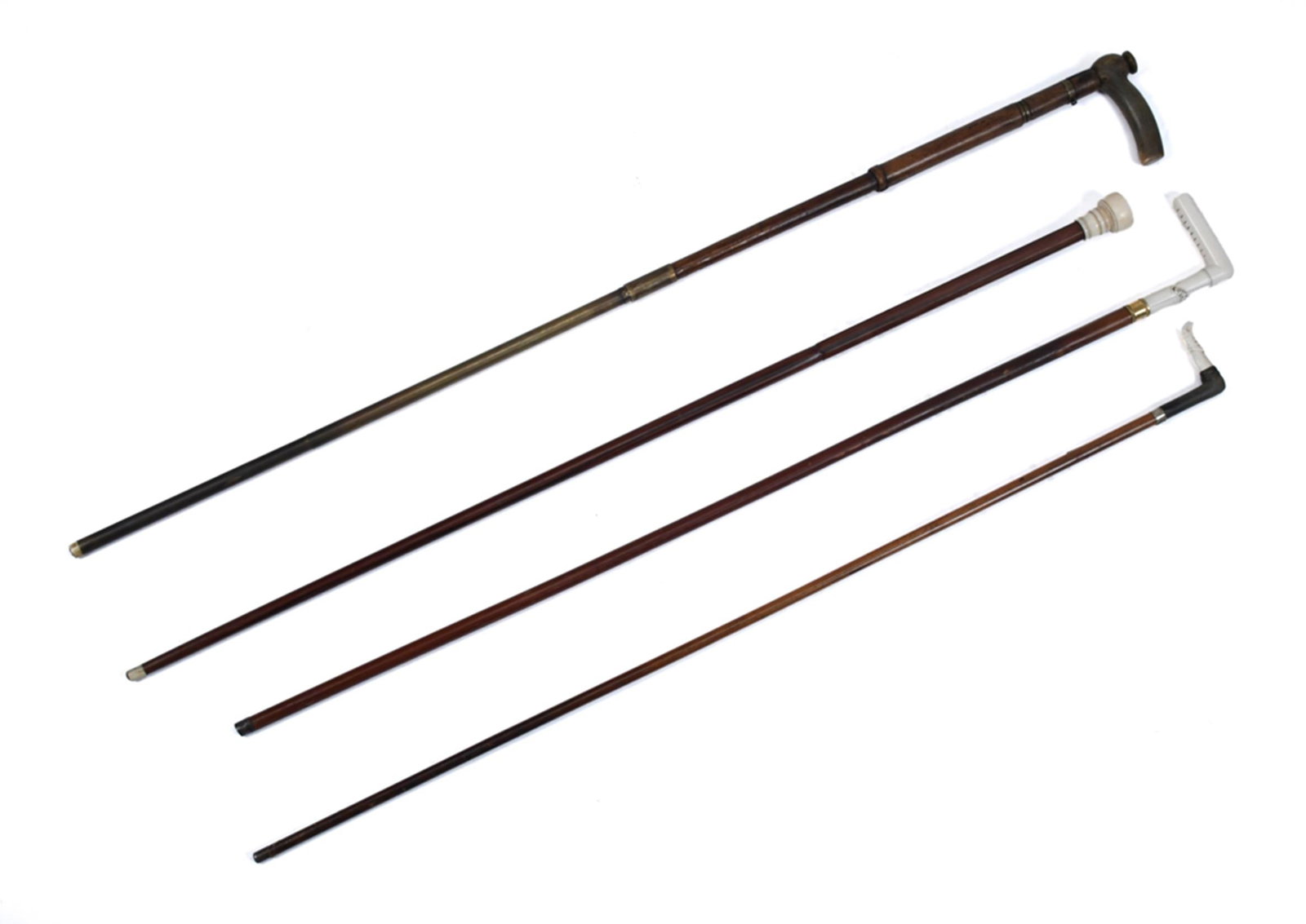 FOUR 19TH C. CANES INCLUDING A GUN CANE. (1 of 1)