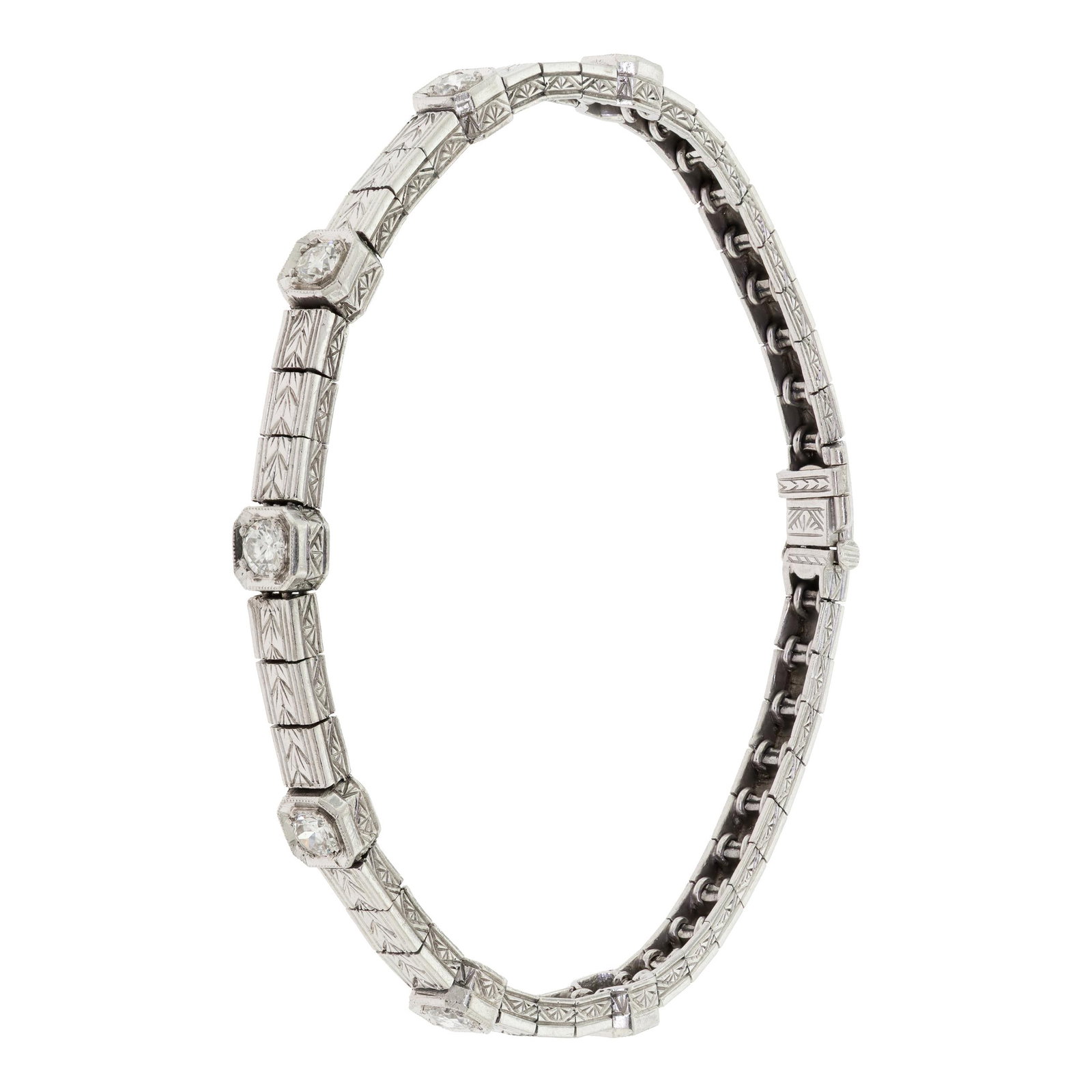 ART DECO HAND-ENGRAVED PLATINUM DIAMOND BRACELET.: An Art Deco, platinum (tested), hand-engraved bracelet, set with approx. 1.0 ct. tw., Old European cut, natural diamonds of G-H color and VS-SI clarity, 5mm wide, 7 1/8 inches long, 19.0 grams.