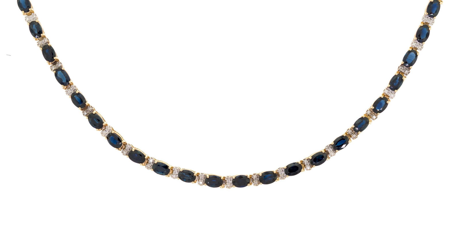 14K GOLD OVAL SAPPHIRE & DIAMOND NECKLACE.: A 14k yellow gold (stamped), line necklace, set with approx. 36 ct. tw., faceted oval, very dark blue sapphires and approx. 1.16 ct. tw., single cut, natural diamonds of H-I color and SI clarity, 5mm