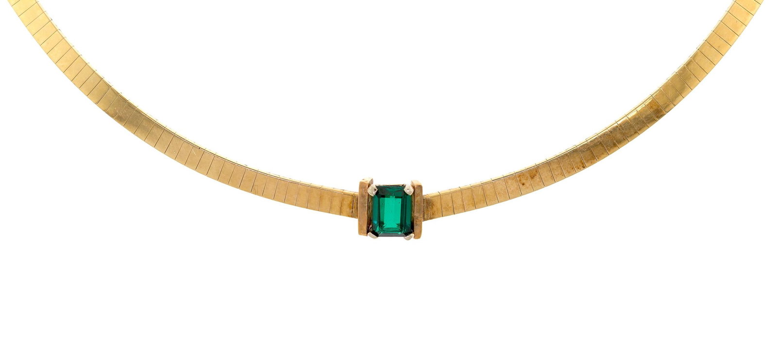 14K GOLD OMEGA SYNTHETIC EMERALD STATION NECKLACE.: A 14k yellow gold (stamped), flat omega station necklace, set with an emerald cut, synthetic emerald, 7x5mm, 4mm wide omega, 27.4 grams.