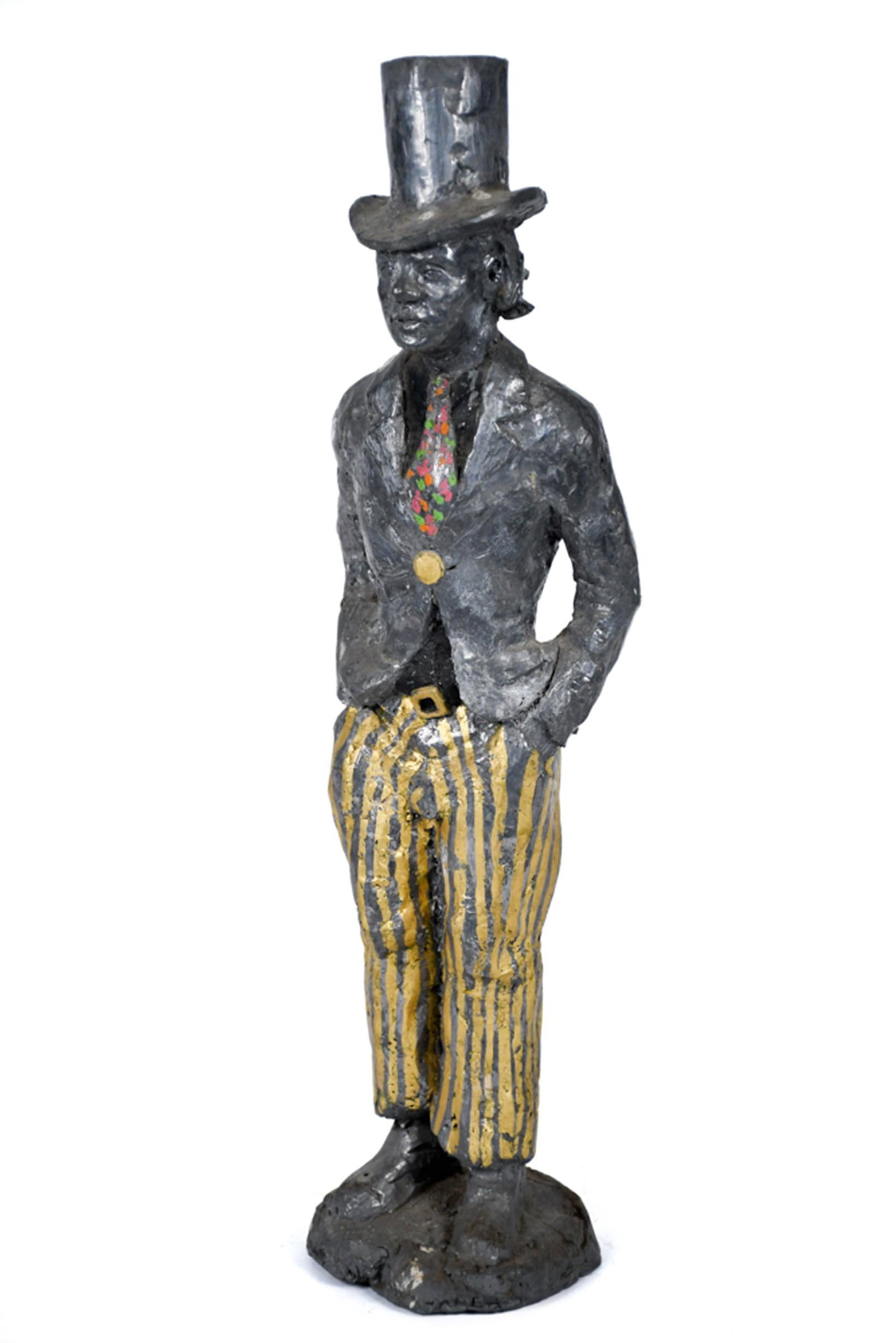 FOLK ART CAST LEAD SCULPTURE, GENTLEMAN.: A 20th C. folk art cast lead sculpture, depicting a dapper gentleman standing with hands in his pockets, dressed in a tall top hat, patterned necktie, and striped trousers. 16”H x 4.5”W.