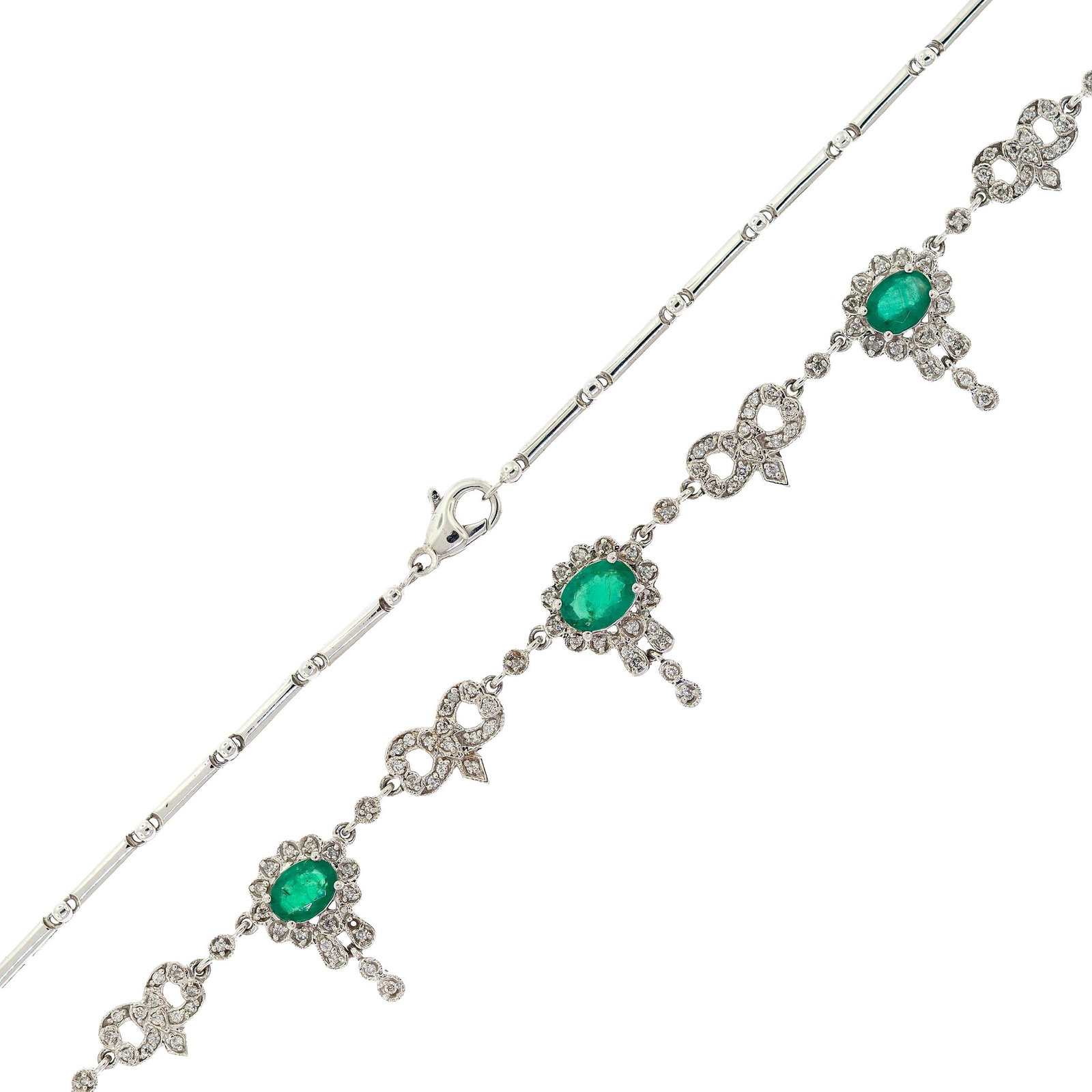 CONTEMPORARY 14K GOLD EMERALD & DIAMOND NECKLACE.: A contemporary, 14k white gold (tested) necklace, set with approx. 2.25 ct. tw., faceted oval, medium dark green, emeralds and approx. .62 ct. tw., round brilliant cut diamonds of G-H-I color and
