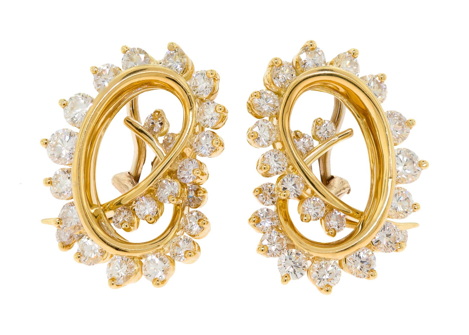 14K GOLD 2.75 CTW PRETZEL-KNOT CLIP-ON EARRINGS.: A pair of 14k yellow gold (tested), pretzel-knot, clip-on earrings set with approx. 2.75 ct. tw., round brilliant cut, natural diamonds of F-G color and VS clarity, approx. 1 inch long, 14.6 grams.