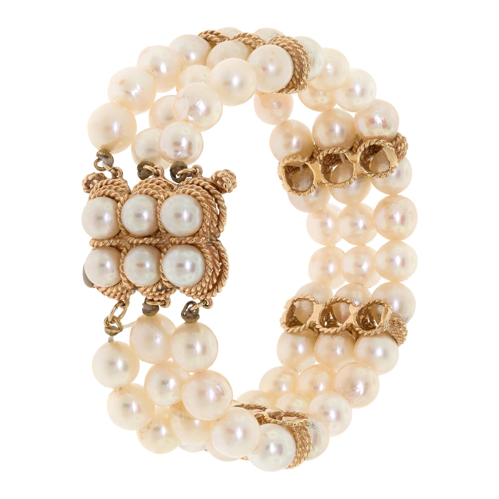 VINTAGE 14K GOLD TRIPLE-STRAND PEARL BRACELET.: A vintage, 14k yellow gold (stamped), triple-strand, bracelet with, 7mm, slightly baroque, light cream to silvery white, cultured pearls with good to very good luster, 6mm pearls in clasp, 1 inch