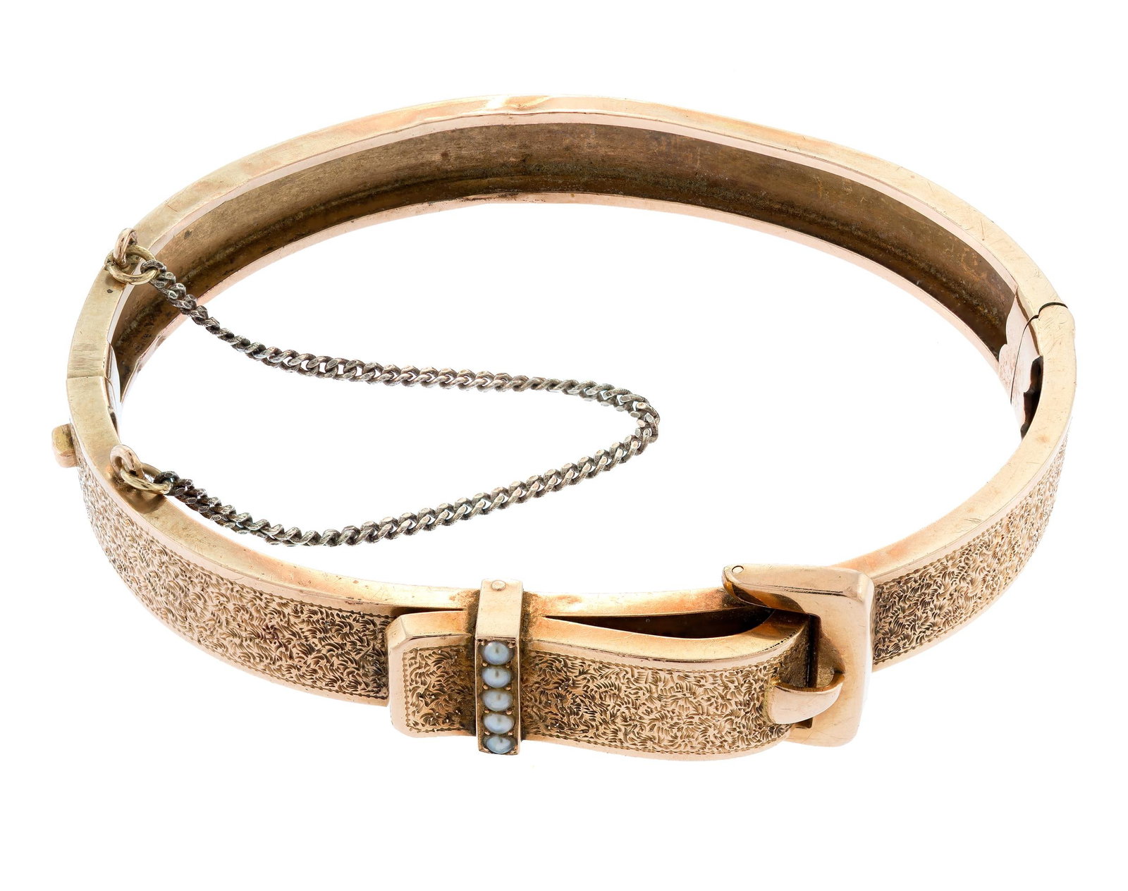 VICTORIAN 14K ROSE GOLD SEED PEARL CUFF BRACELET.: A Victorian, 14k rose gold (tested), hand-engraved, belt and buckle, seed pearl, hinged-cuff bracelet, 6 5/8 inch wrist, buckle is 13mm wide, 14.8 grams.