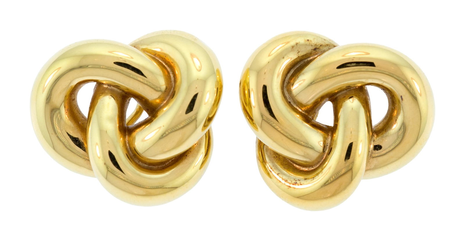 18K GOLD ROBERTO COIN LOVE-KNOT CLIP EARRINGS.: A pair of signed, Roberto Coin, 18k yellow gold (stamped, 1226 VI), hollowform, love-knot, clip-on earrings with signature ruby on reverse, approx. 1 inch, 9.9 grams. Provenance: a prominent Washingto