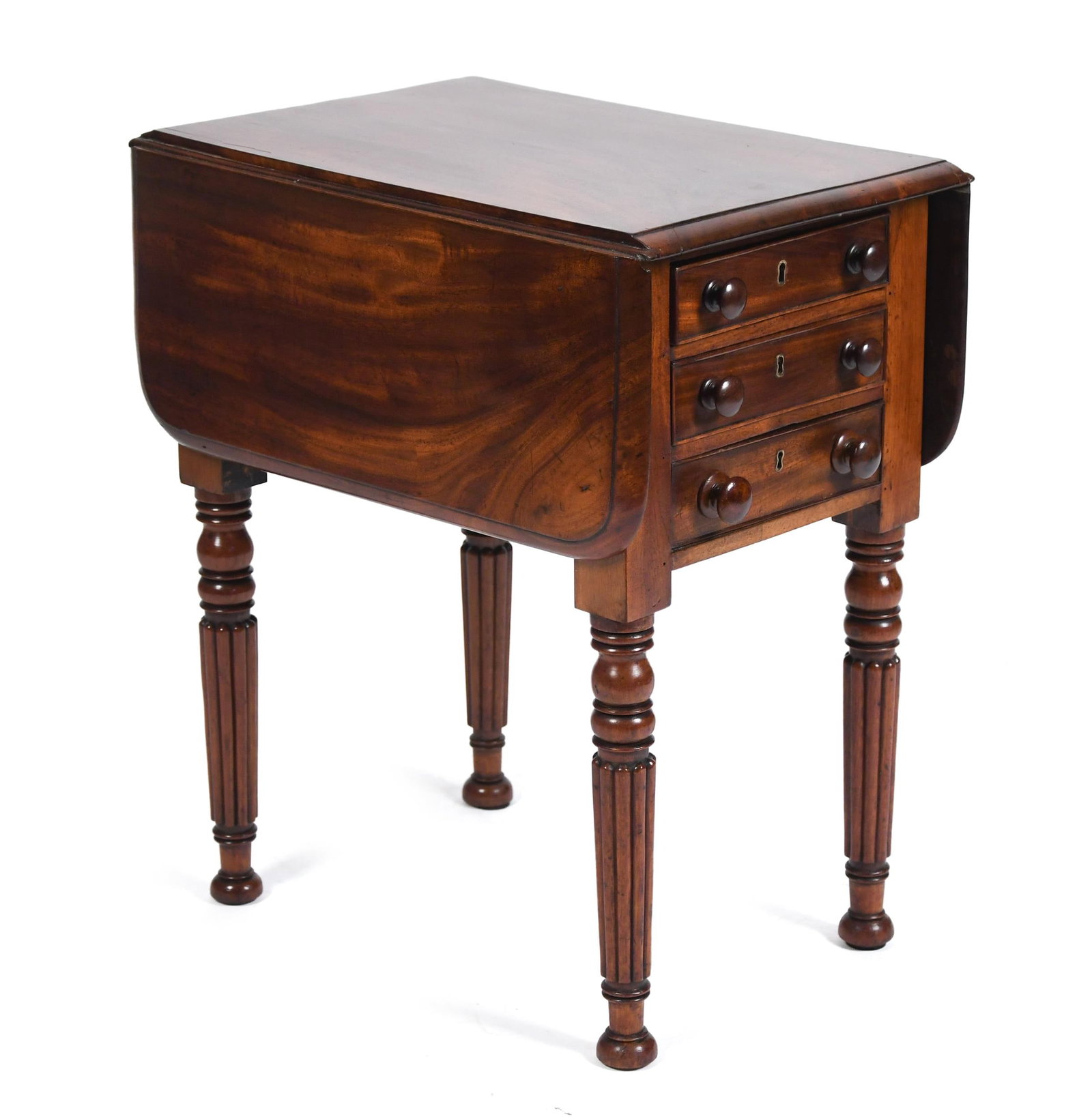19TH C. DIMINUTIVE REGENCY THREE DRAWER WORK STAND.: A ca. 1820 diminutive or child size Regency mahogany work stand, with drop leaves, three functioning drawers, on front side, three simulated drawers on back, on reeded legs. 24”H x 14”W