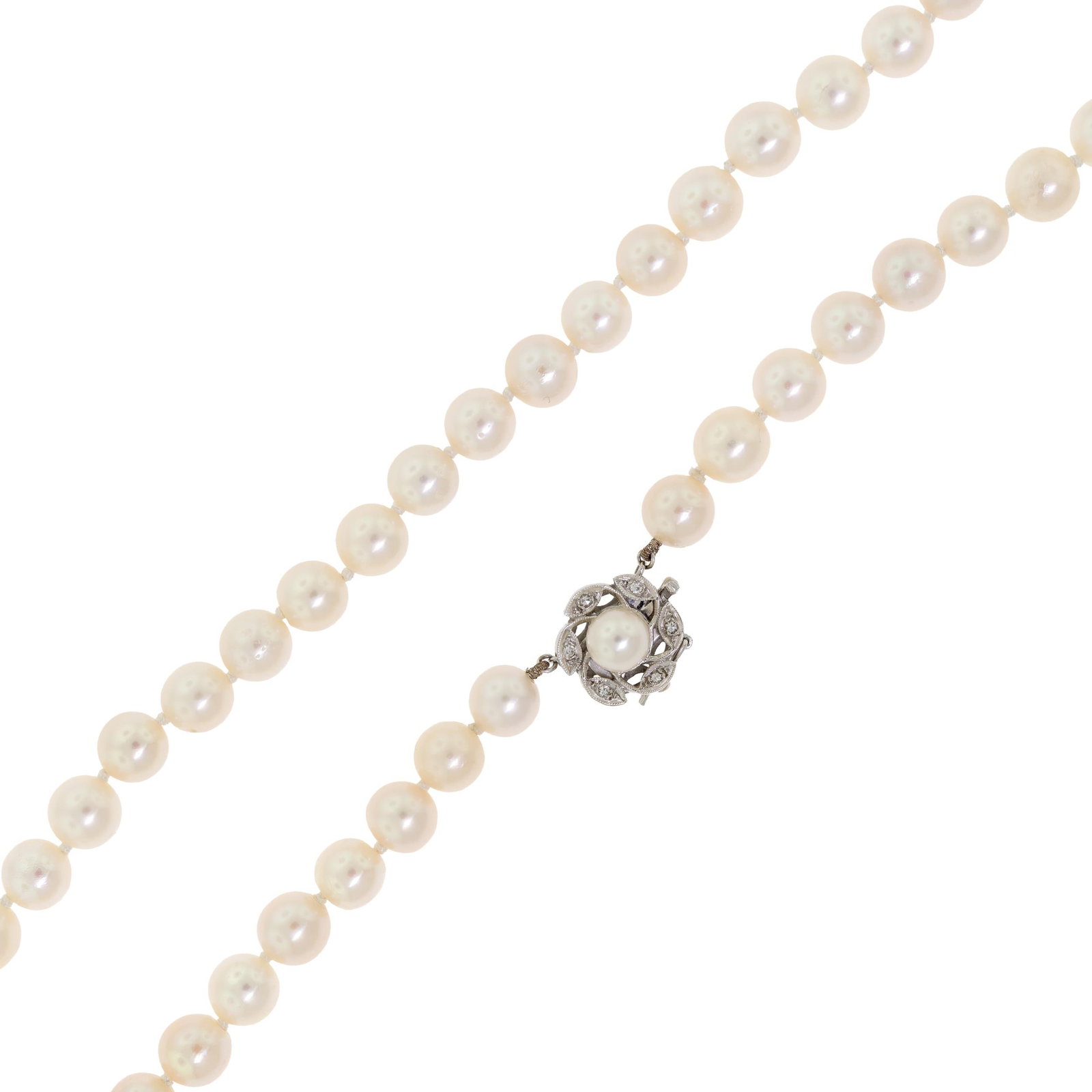 VINTAGE CULTURED PEARL NECKLACE W/ 14K GOLD CLASP.: A vintage, 14k white gold (stamped), cultured pearl necklace, 7.5-8.0mm round to near-round, light cream pearls with good to very good luster, lightly blemished, the clasp is set with approx. .06 ct. 