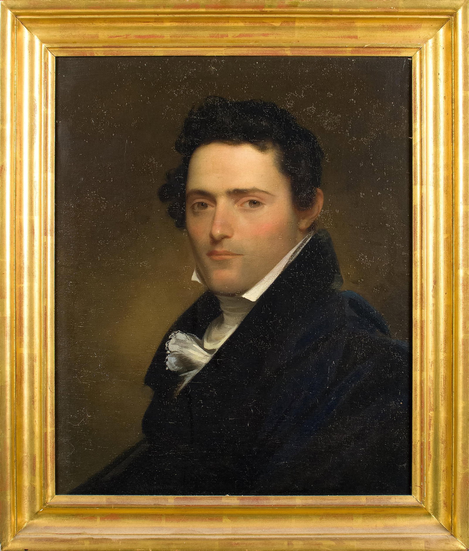 CA. 1820 PORTRAIT OF GEORGE WHEELER BRUEN.: A ca. 1820 American School portrait of George Wheeler Bruen, oil on canvas. The sitter shown half length and turned to the left, a young man with dark curly hair, wearing a black coat with a wide