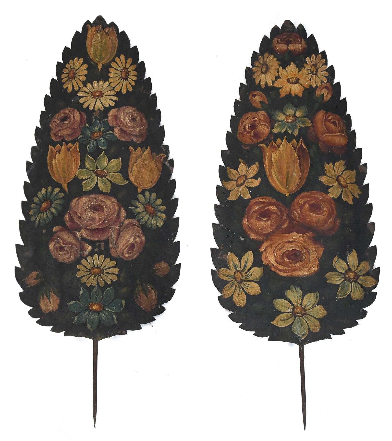 PR. FRENCH TOLE PAINTED FLORAL TIN LEAF PANELS.: A pair of 19th C. French tole painted tin panel of leaf form, the serrated slate blue ground decorated with tulips, roses and daisies in yellow, salmon and green, the reverse with riveted iron cross