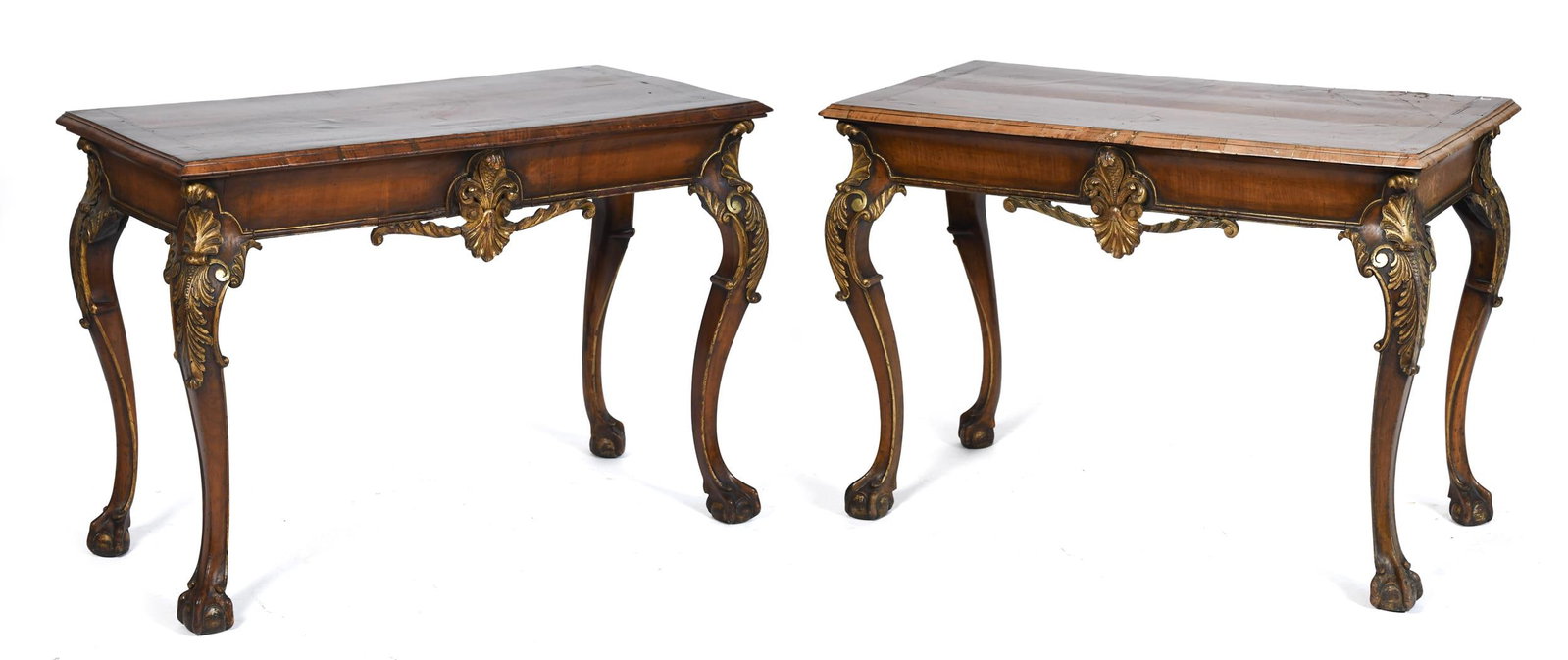 PR 19TH C. ENGLISH CHIPPENDALE STYLE PIER TABLES.: A pair of 19th C. English Chippendale style walnut and parcel gilt pier tables. Each with a rectangular crossbanded top over a shaped apron centered by a carved and gilt shell and foliate cartouche,